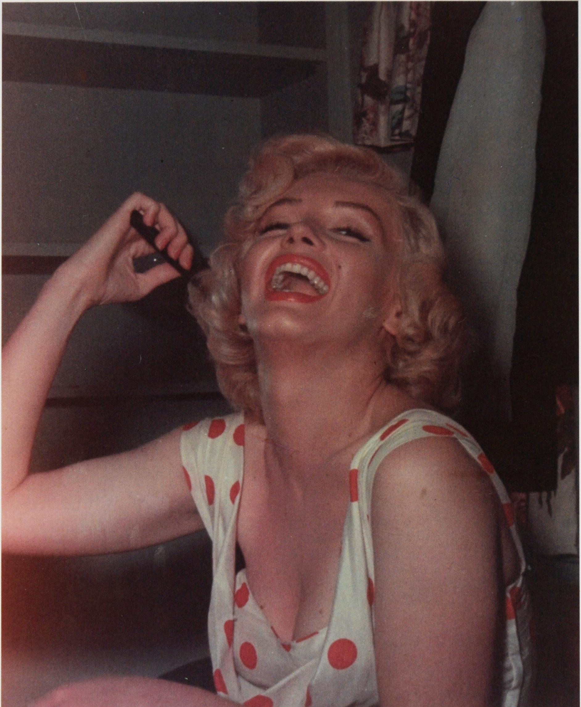 Original Marilyn Monroe Photograph

Original photograph of Marilyn Monroe posing in her dressing room on the film of 
