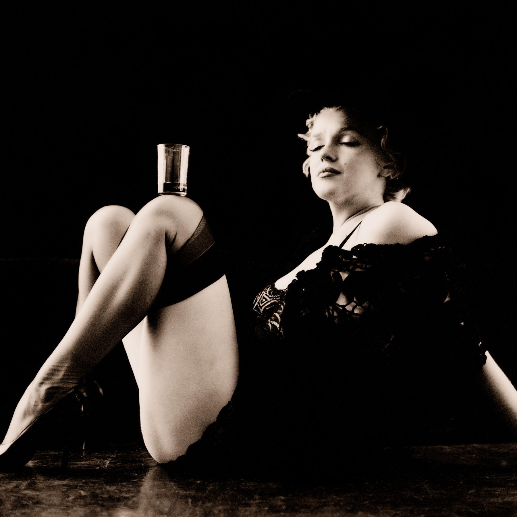 Milton H. Greene Figurative Photograph - Marilyn Monroe, "Black Sitting"