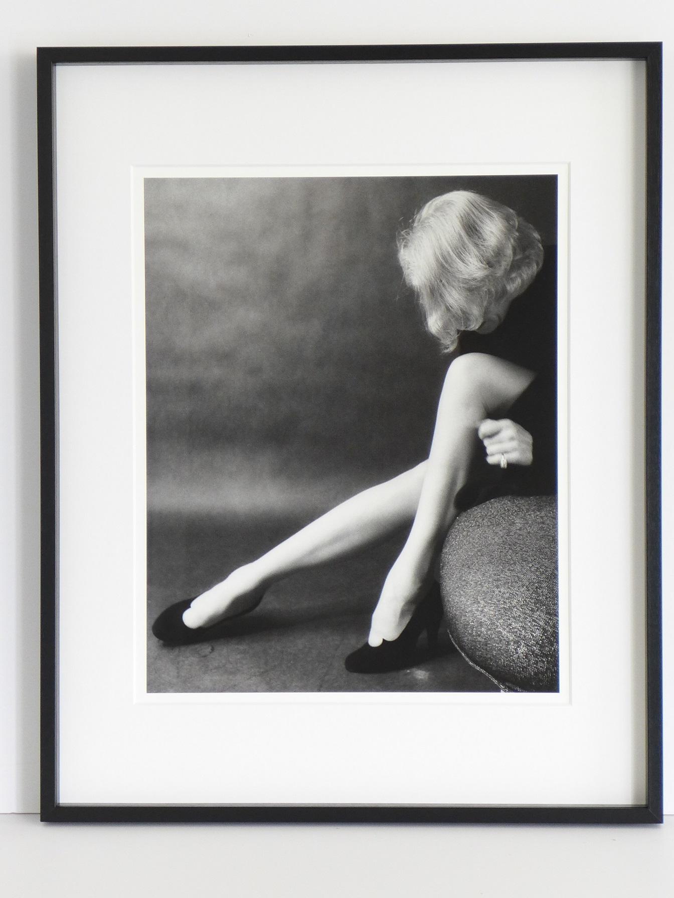 Marlene Dietrich - German-American film star and icon and her famous legs - Photograph by Milton H. Greene