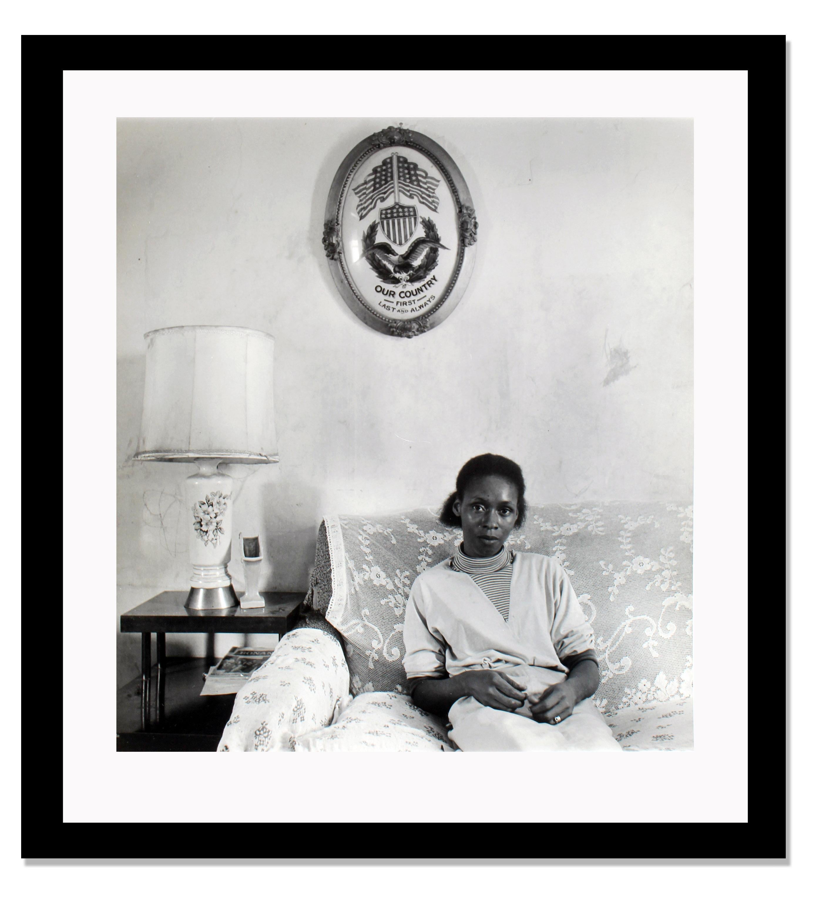 An original gelatin silver print by American social documentary photographer Milton Rogovin depicting a resident of Buffalo's East Side in the early 1960's.  This work is hand signed on the reverse by Rogovin and was created by his hand in the