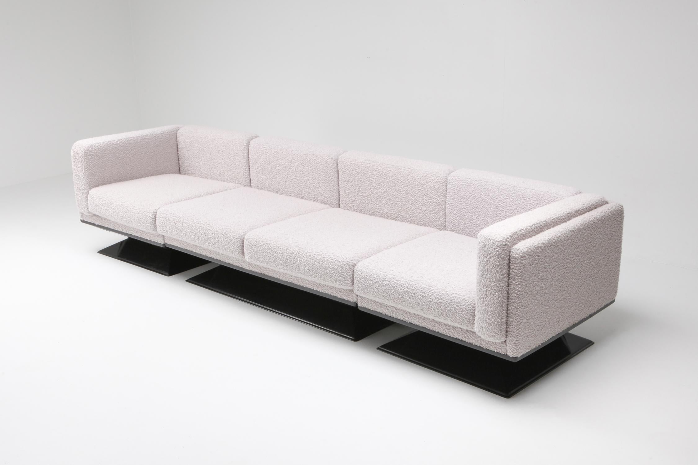 Postmodern modular couch by Luigi Pellegrin for MIM Roma.
A newly upholstered piece in luxury bouclé wool by Pierre Frey.

Consisting of four modular pieces to shape this sectional sofa in various ways.

MIM Roma was founded in Rome, Italy in