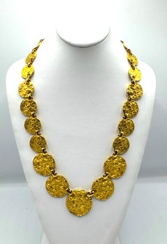 Collar largo de Mimi di Niscemi de los años 70 con eslabones de discos graduados y pepitas de oro
