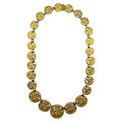 Collar largo de Mimi di Niscemi de los años 70 con eslabones de discos graduados y pepitas de oro