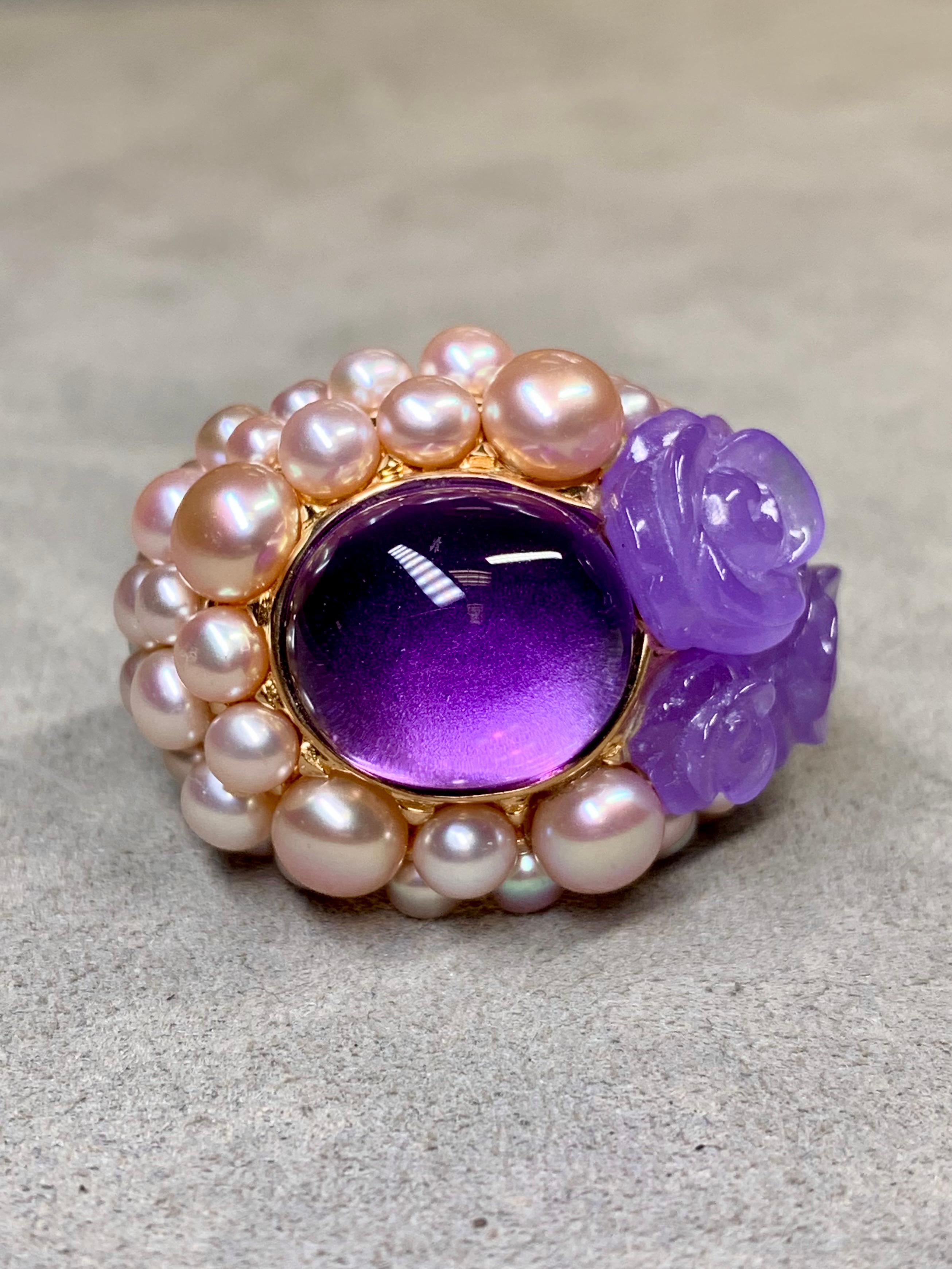An oversized and impressive ring by Italian maker, Mimi Milano. Incredibly well crafted in rose gold, this ring boasts carved lavender and green jade as well as various sized cultured pearls and centered by natural cabochon