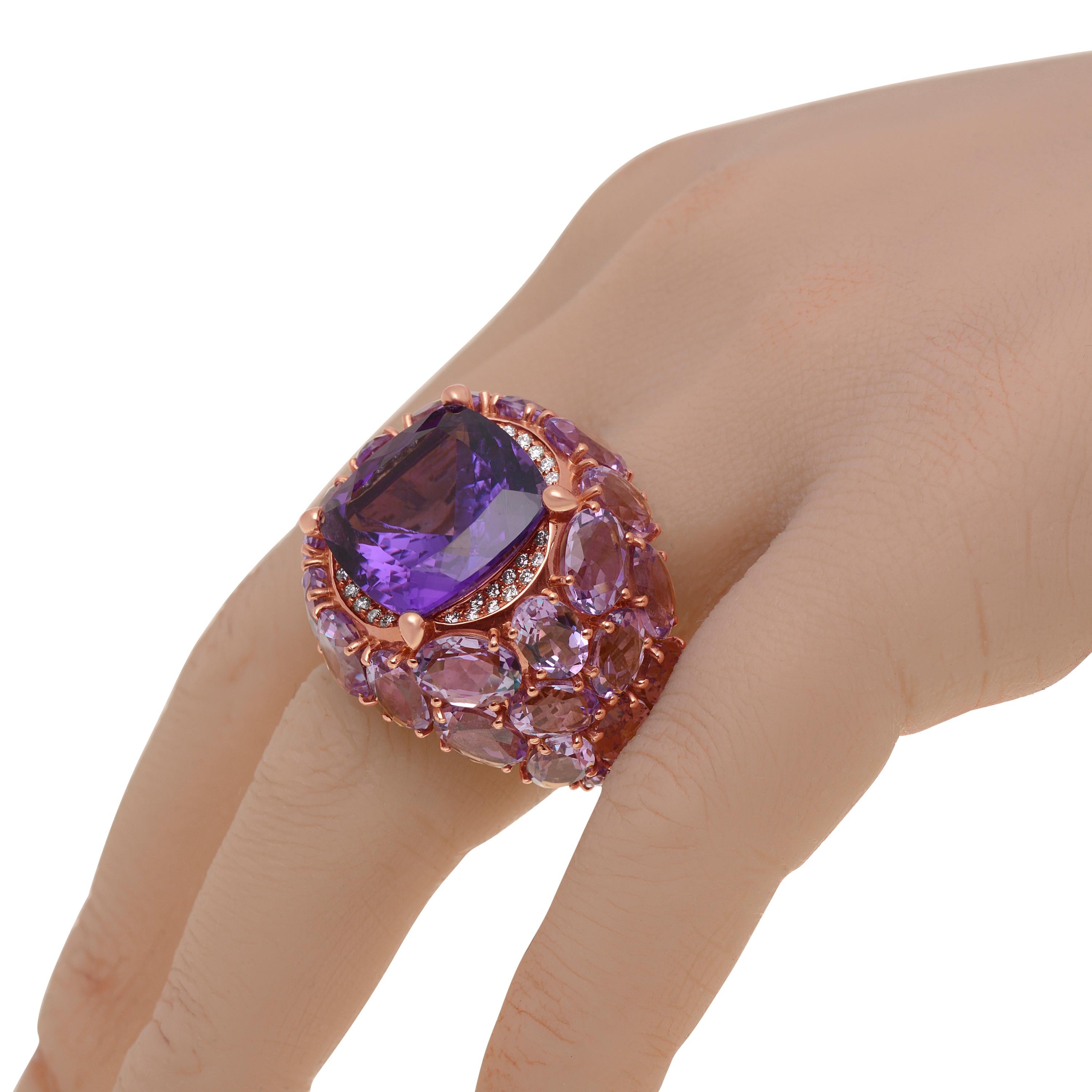 This bejeweled Mimi Milano 18K rose gold statement ring features amethyst and 0.42ct. tw. diamonds set in 18K rose gold. The ring size is 7.25 (54.5). The band width is 1/4