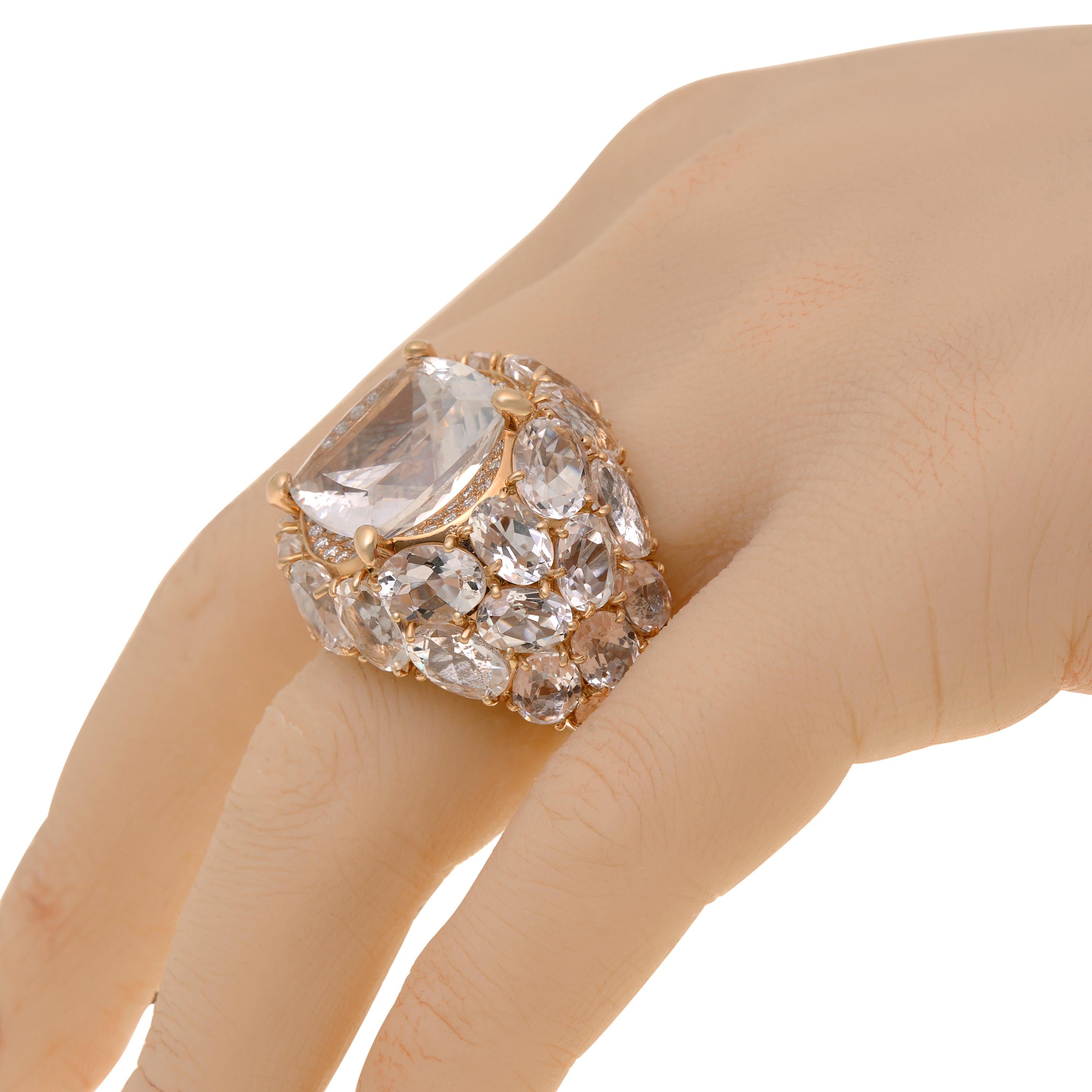 This bejeweled Mimi Milano 18K rose gold statement ring features rock crystal and 0.44ct. tw. diamonds set in 18K rose gold. The ring size is 6.5 (54.5 - 53). The band width is 3/8