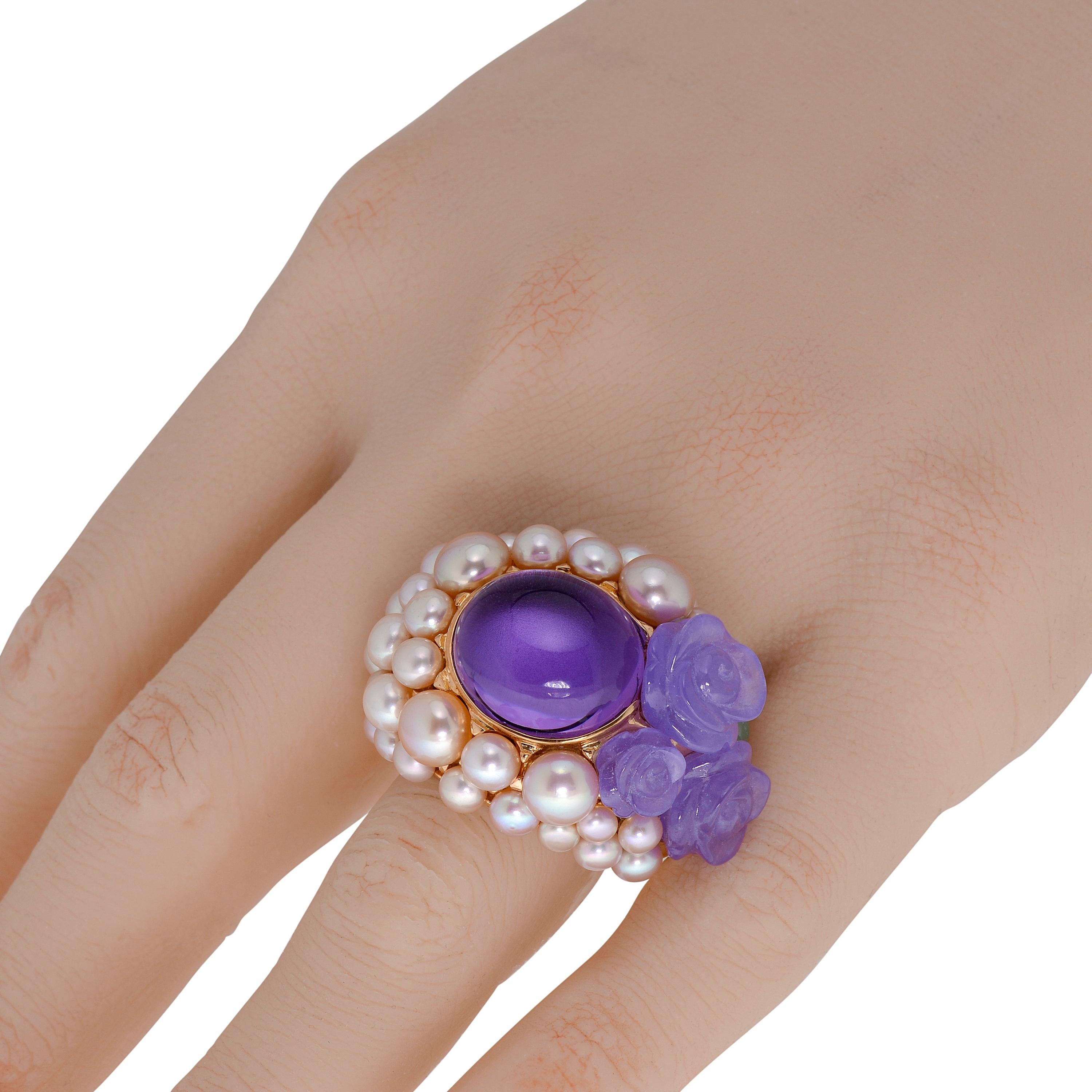 This dazzling Mimi Milano 18K rose gold cocktail ring features 3-5mm violet cultured pearls and 11.83ct. tw. cabochon amethyst in perfect harmony with Lavender Jade roses and Green Jade . The ring size is 8.5. The band width is 7mm. The weight is
