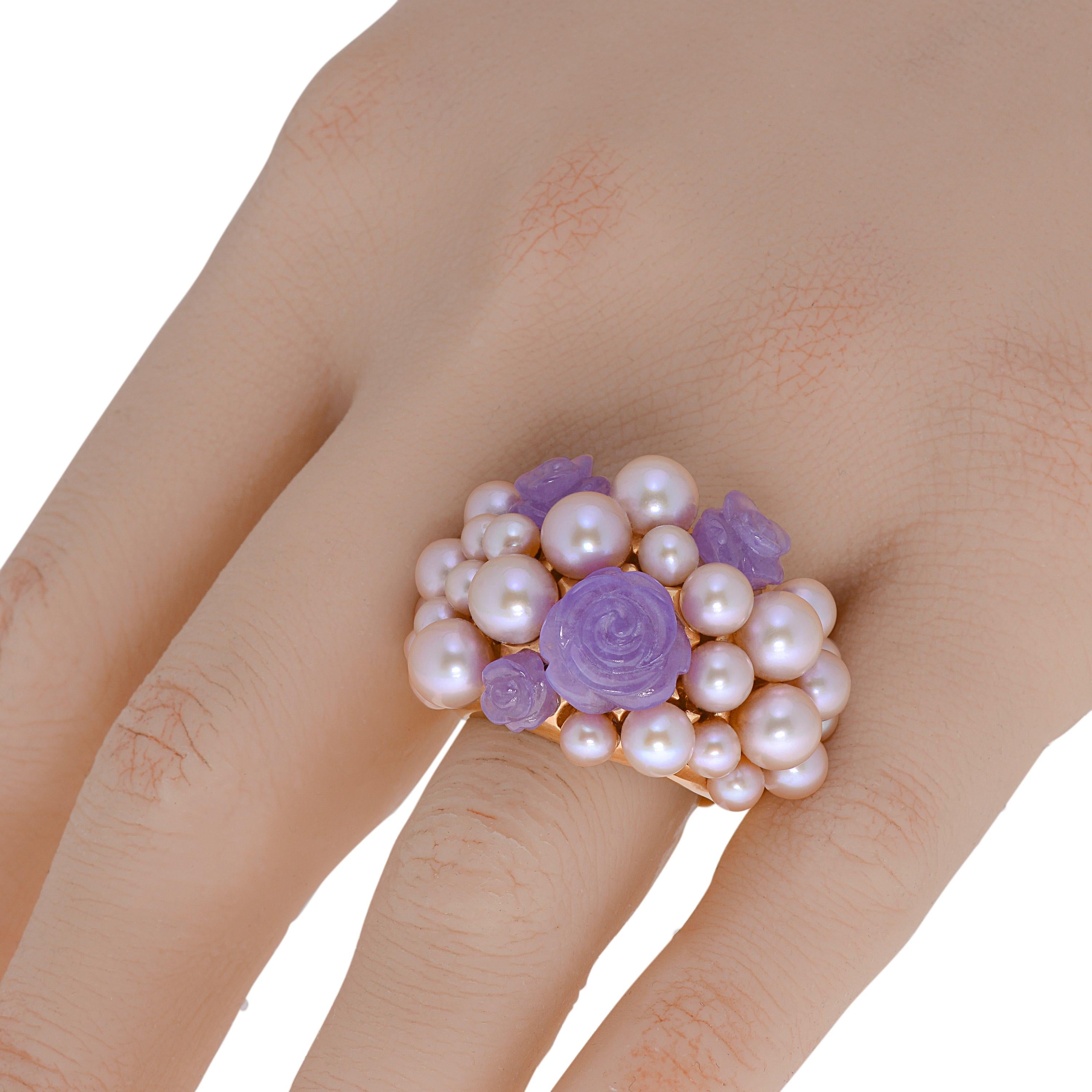 This ornate Mimi Milano 18K rose gold cocktail ring features 4-6mm violet cultured pearls elevated with 11.40ct. tw. Lavender Jade roses. The ring size is 7. The band width is 1/4
