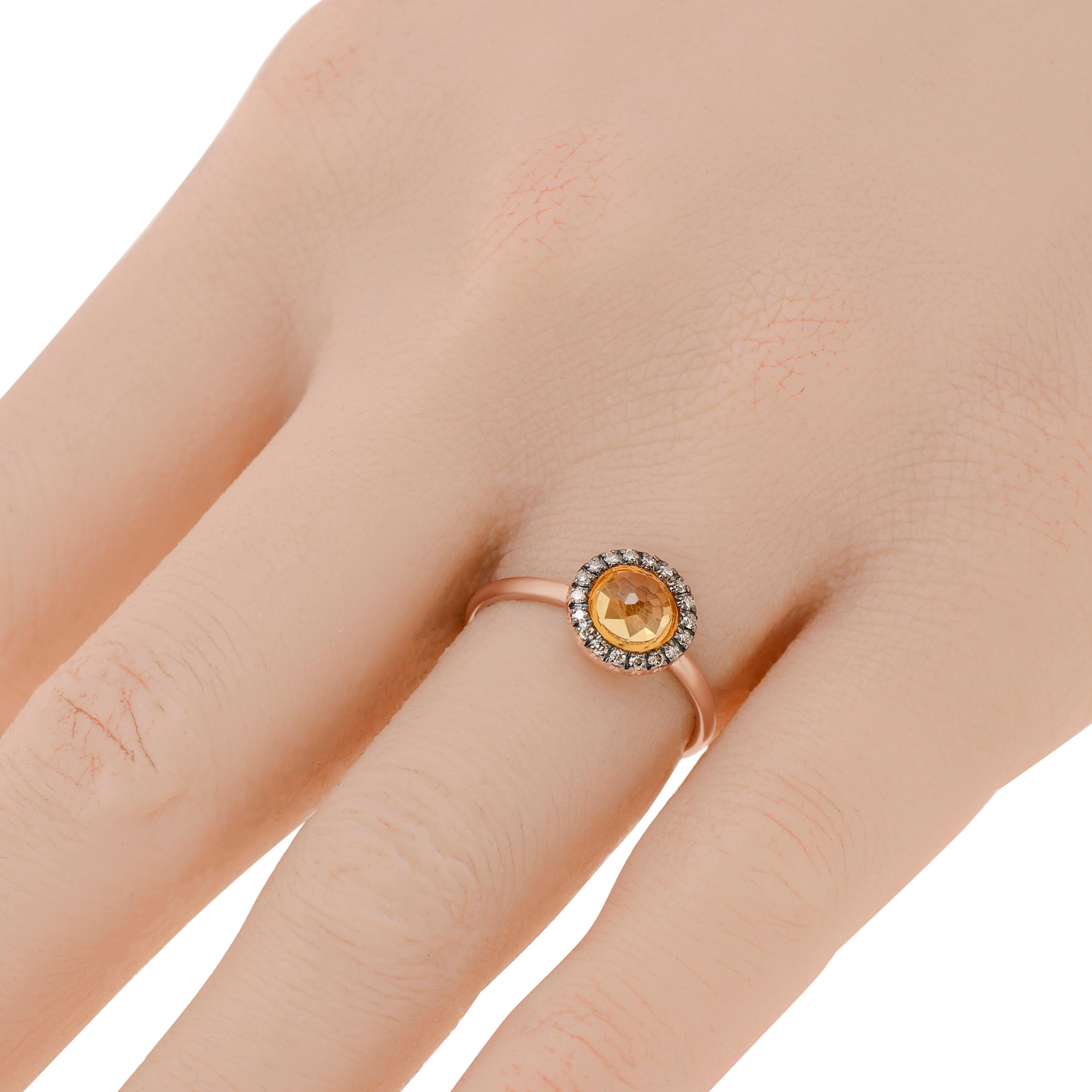 Mimi Milano 18K rose gold halo ring features a faceted Citrine center shimmering with a 0.12ct. tw. brown diamond halo. The ring size is 5.75 (51.3). The decoration size is 3/8