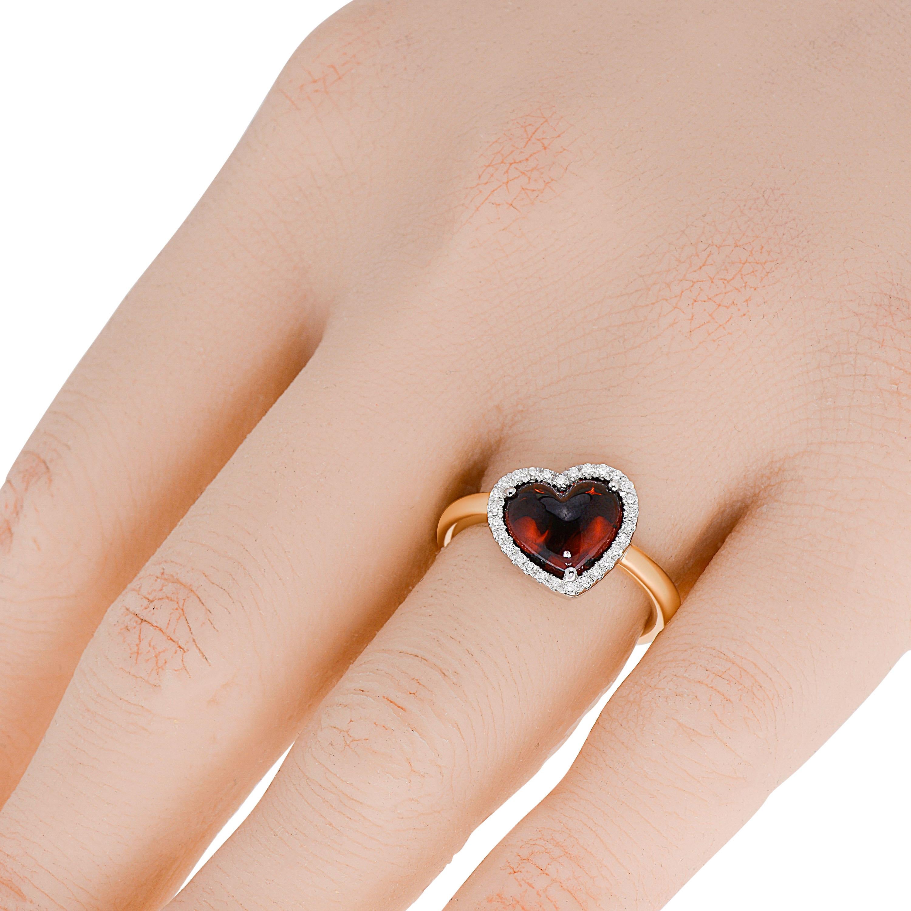 Mimi Milano 18K Yellow and white gold halo ring features a glittering 0.14ct. tw. diamond halo and 3.91ct. tw. cabochon garnet. The ring size is 6.25. The decoration size is 1/2