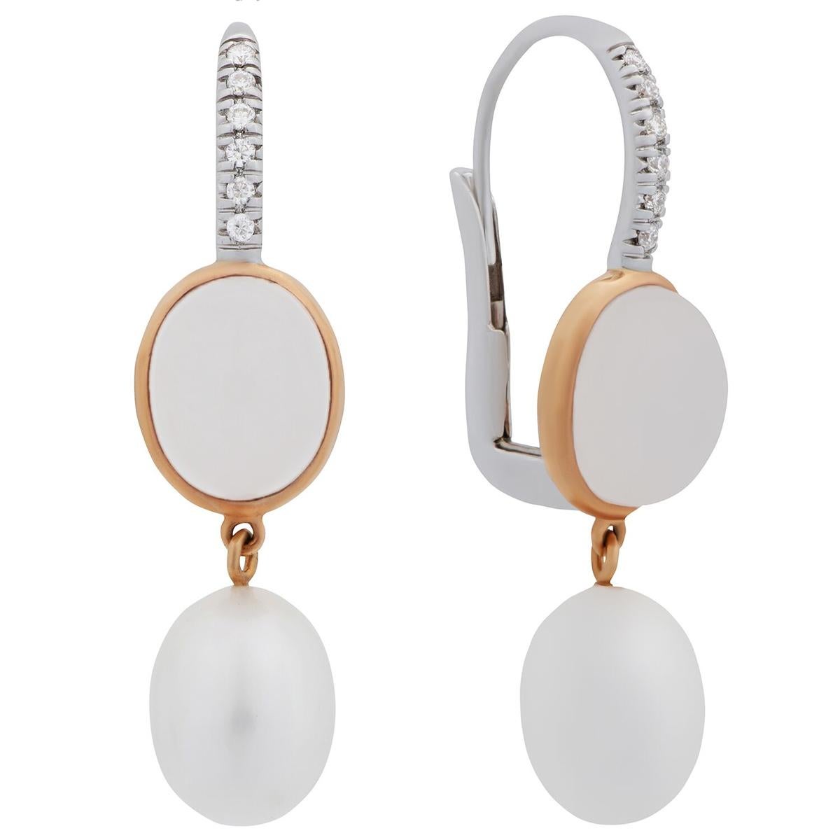 A fabulous pair of Mimi Milano earrings featuring 6.72cts of milky quartz, complemented with 8mm freshwater pearls in 18k white gold and rose gold.
