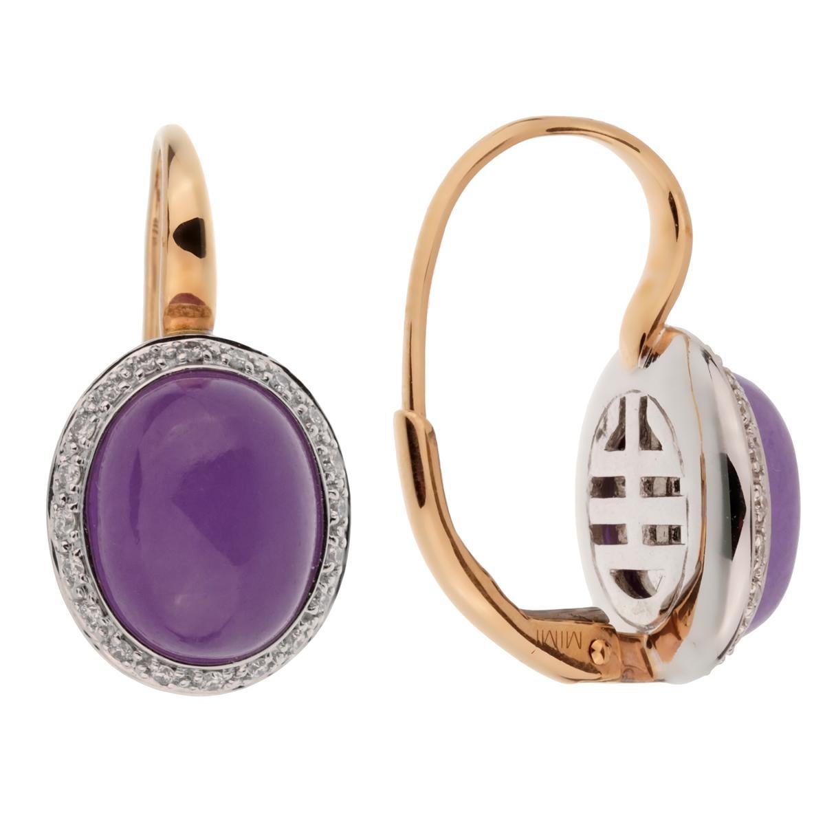 A stunning set of Mimi Milano drop earrings showcasing 8.20ct of Violet Jade encased with .20ct of round brilliant cut diamonds in 18k gold.

Sku: 2496