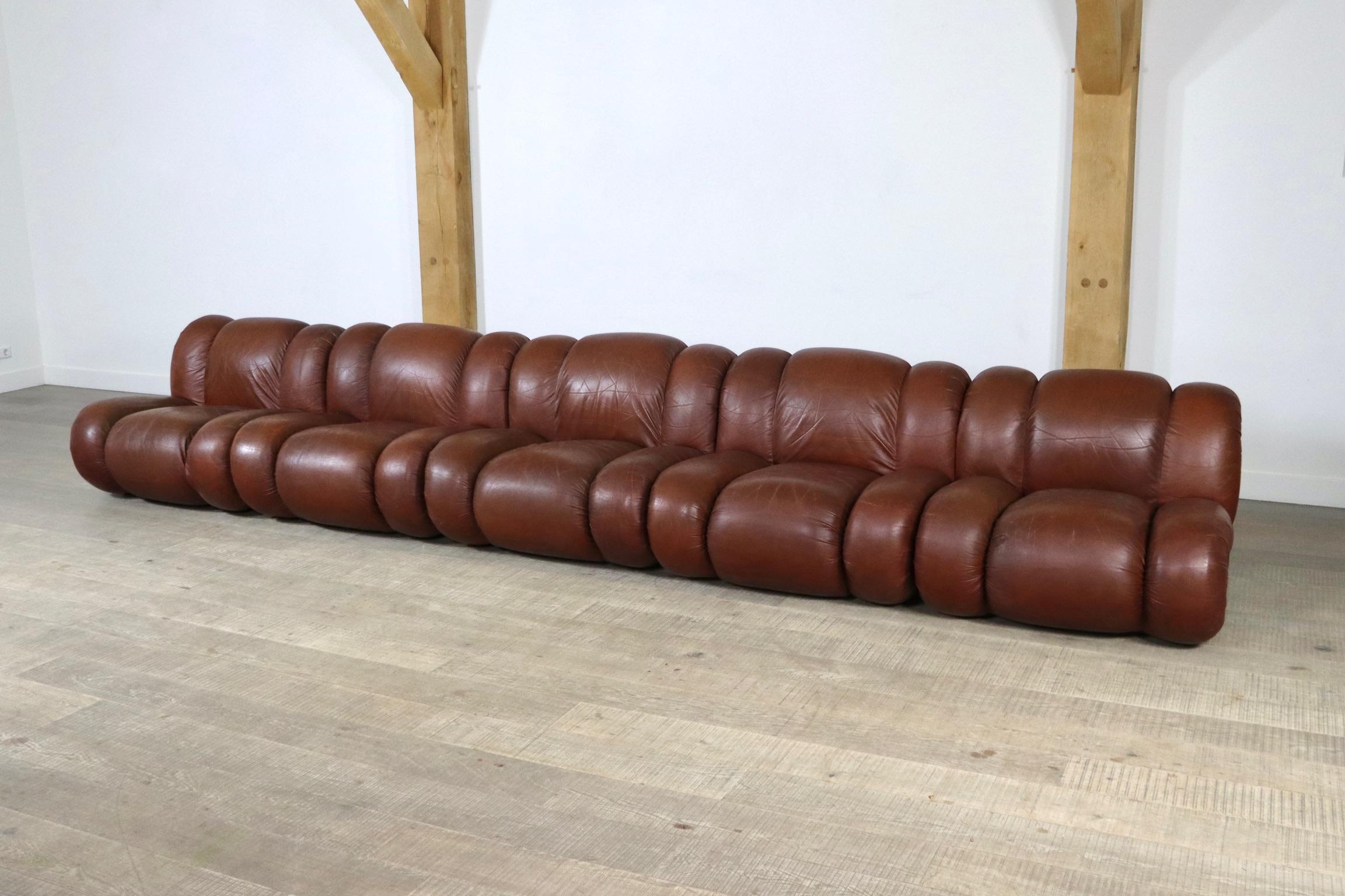 Very rare and beautiful brown leather and chrome Velasquez modular sofa by Mimo Padova, Italy 1970s. Outstanding comfort meets design in this chunky modular sofa. The sofa is designed that when you sit in it, you sink into the sofa seating, allowing