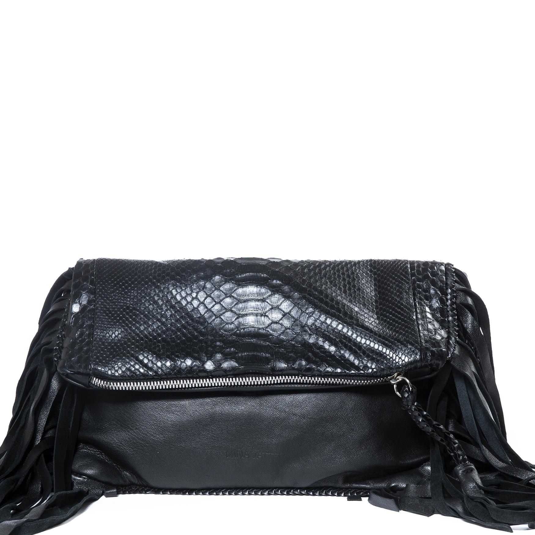 Very good condition

Mina Vatter Black Fringe Clutch

Looking for a beautiful, unique, yet easy-to-combine clutch?
This gorgeous clutch by Mina Vatter is crafted from black leather and features fringe details. 
A part of the clutch is smooth and a