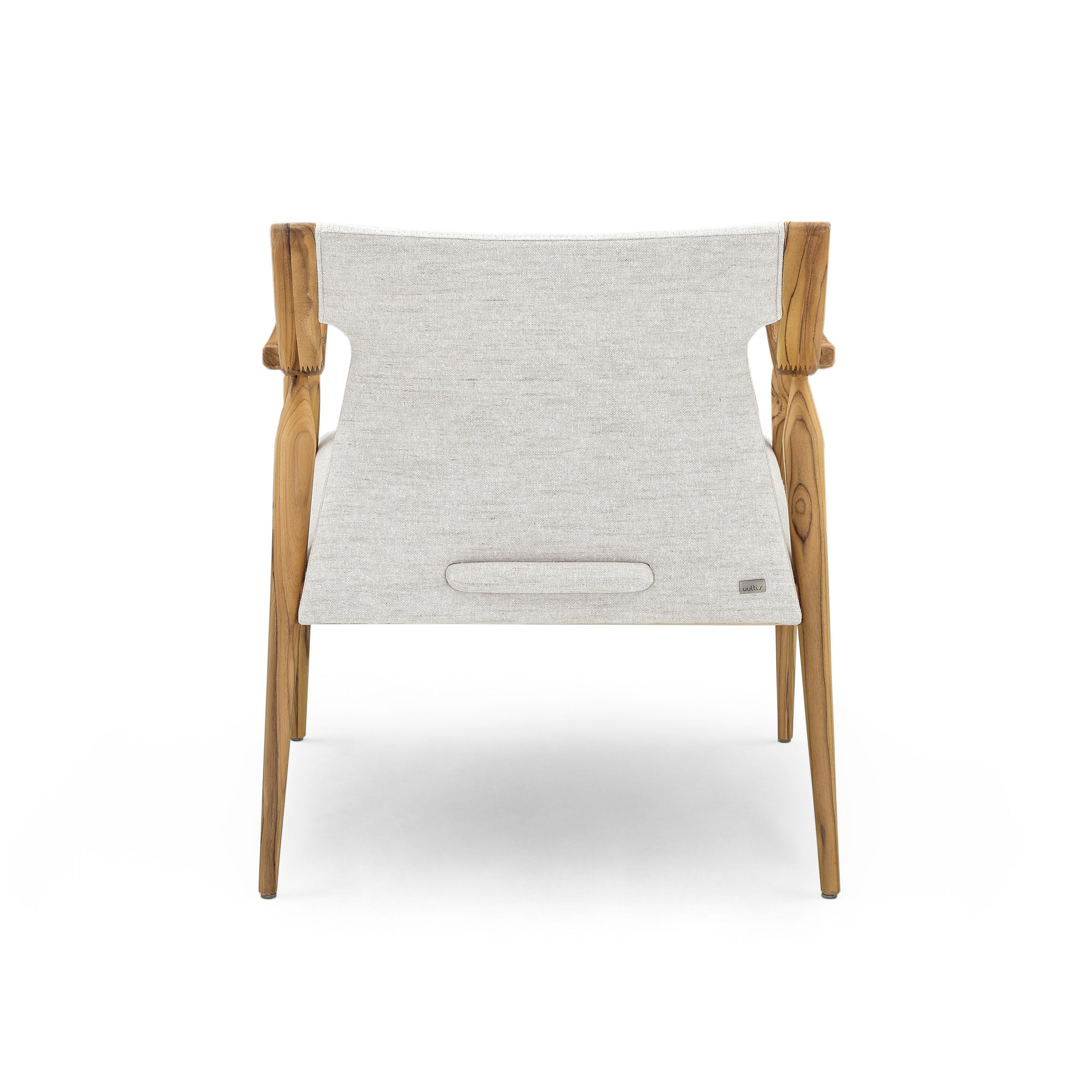 The Mince armchair is a welcoming addition to any room in your modern home decor with its teak finish curved arms and spindle legs, and an off-white beautiful and soft fabric for the cushions. This modern chair has a clean minimalist simple design