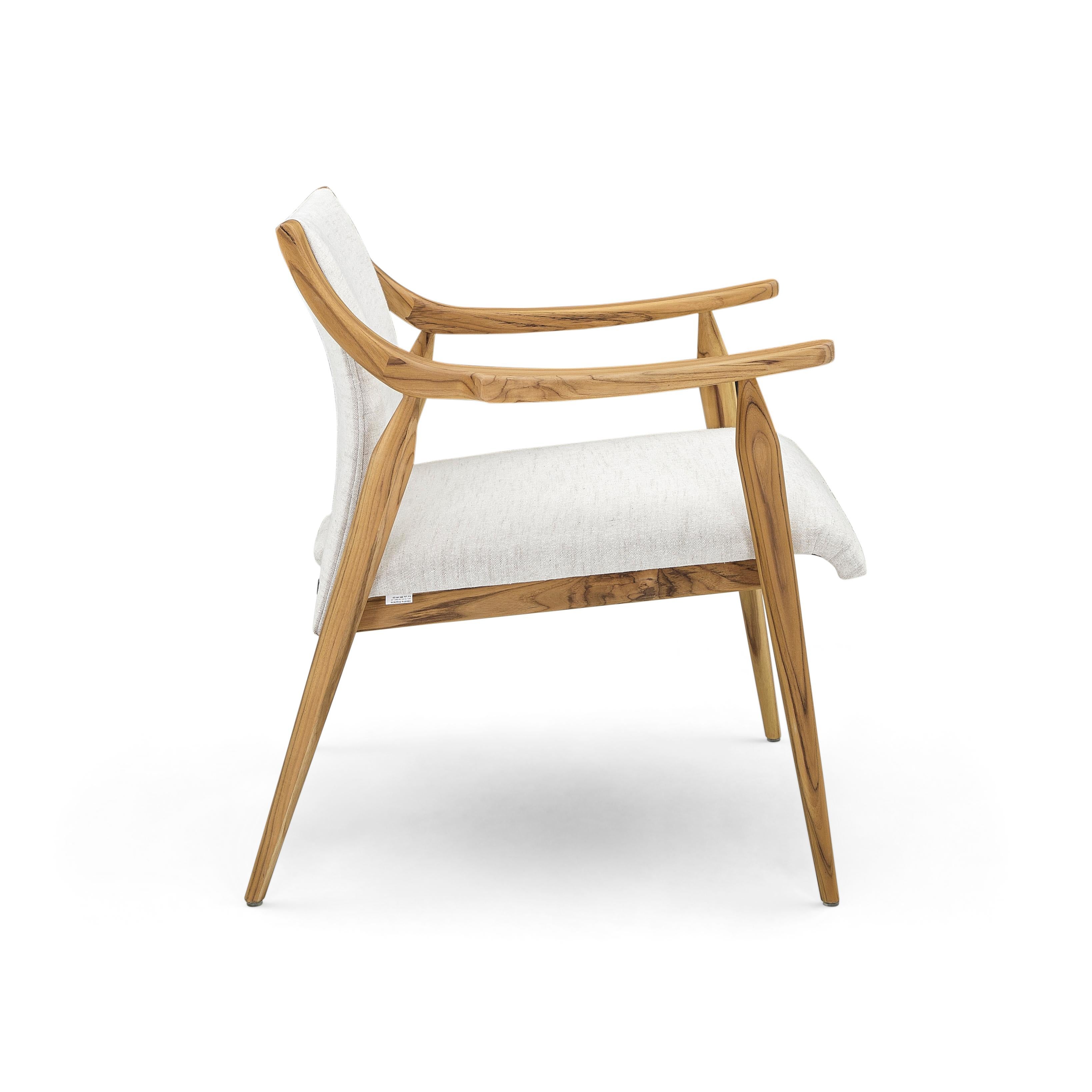 Brazilian Mince Armchair Featuring Curved Arms and Spindle Legs in Teak Wood Finish For Sale