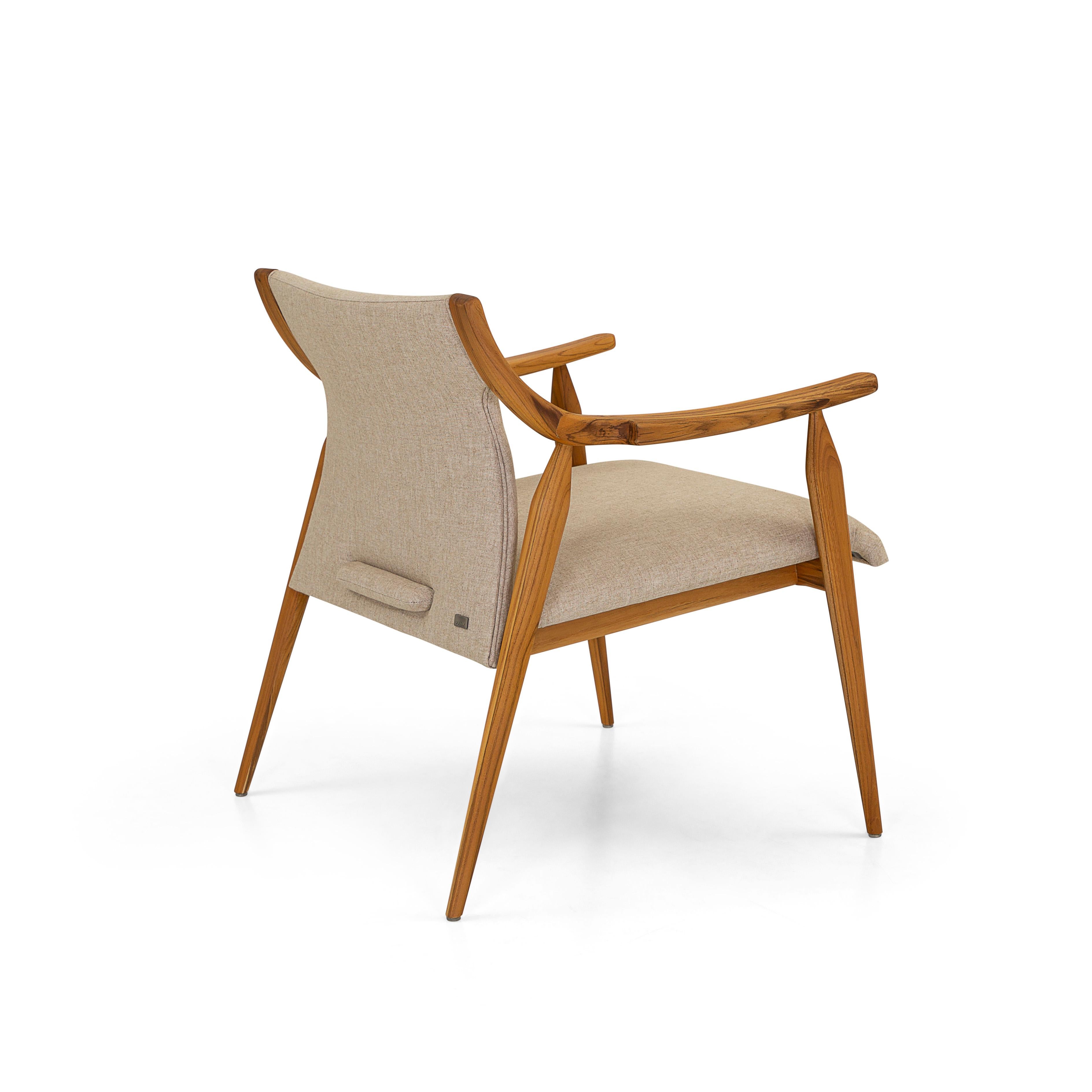 Brazilian Mince Armchair Featuring Curved Arms and Spindle Legs in Teak Wood Finish For Sale