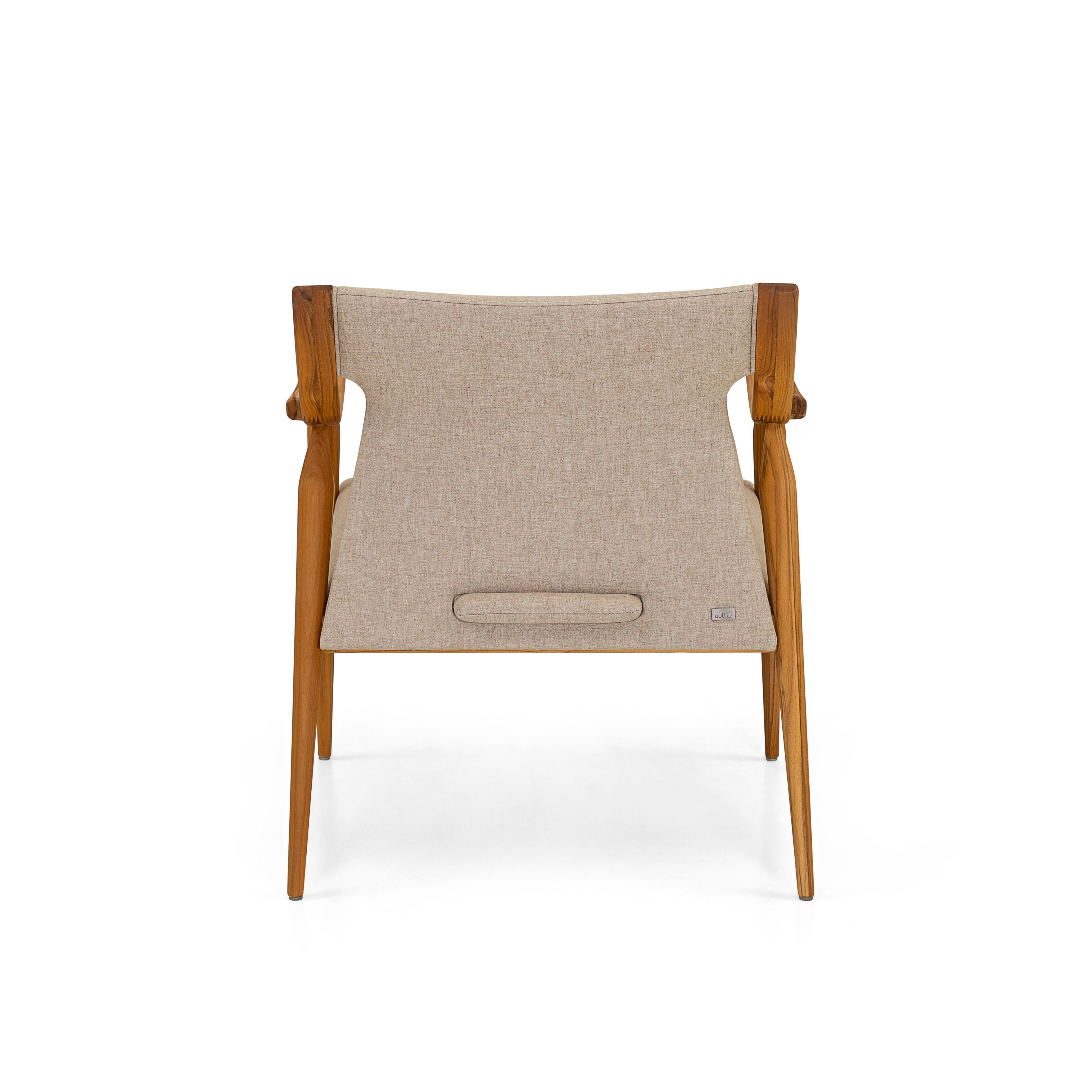 Mince Armchair Featuring Curved Arms and Spindle Legs in Teak Wood Finish In New Condition For Sale In Miami, FL