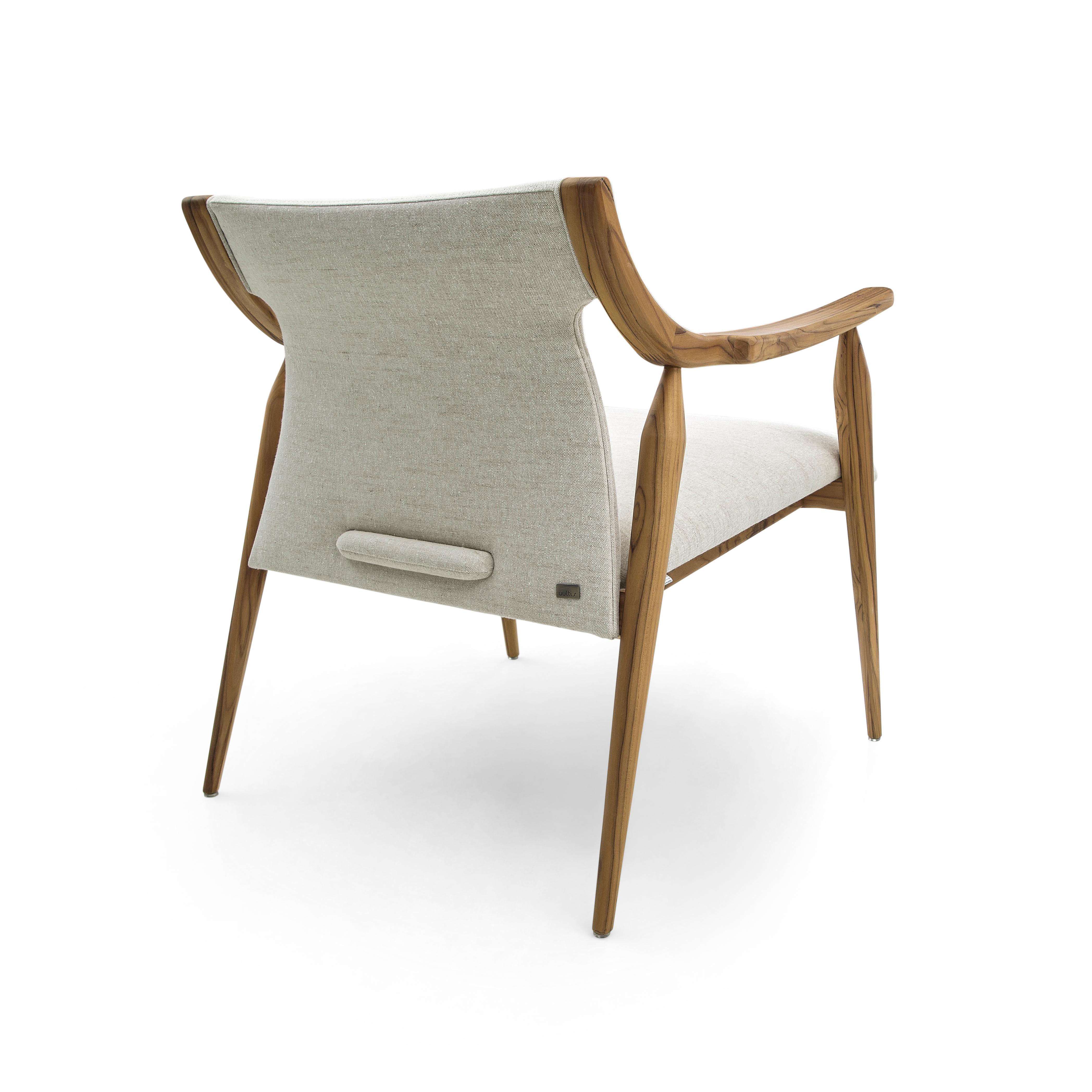 Mince Armchair Featuring Curved Arms and Spindle Legs in Teak Wood Finish For Sale 1