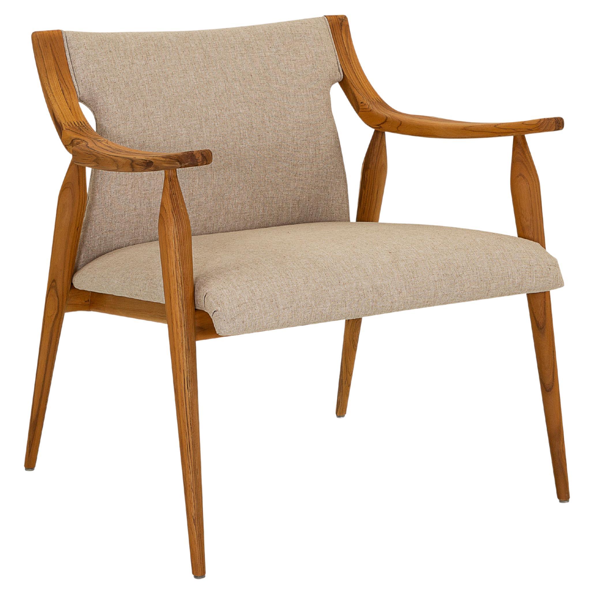 Mince Armchair Featuring Curved Arms and Spindle Legs in Teak Wood Finish For Sale