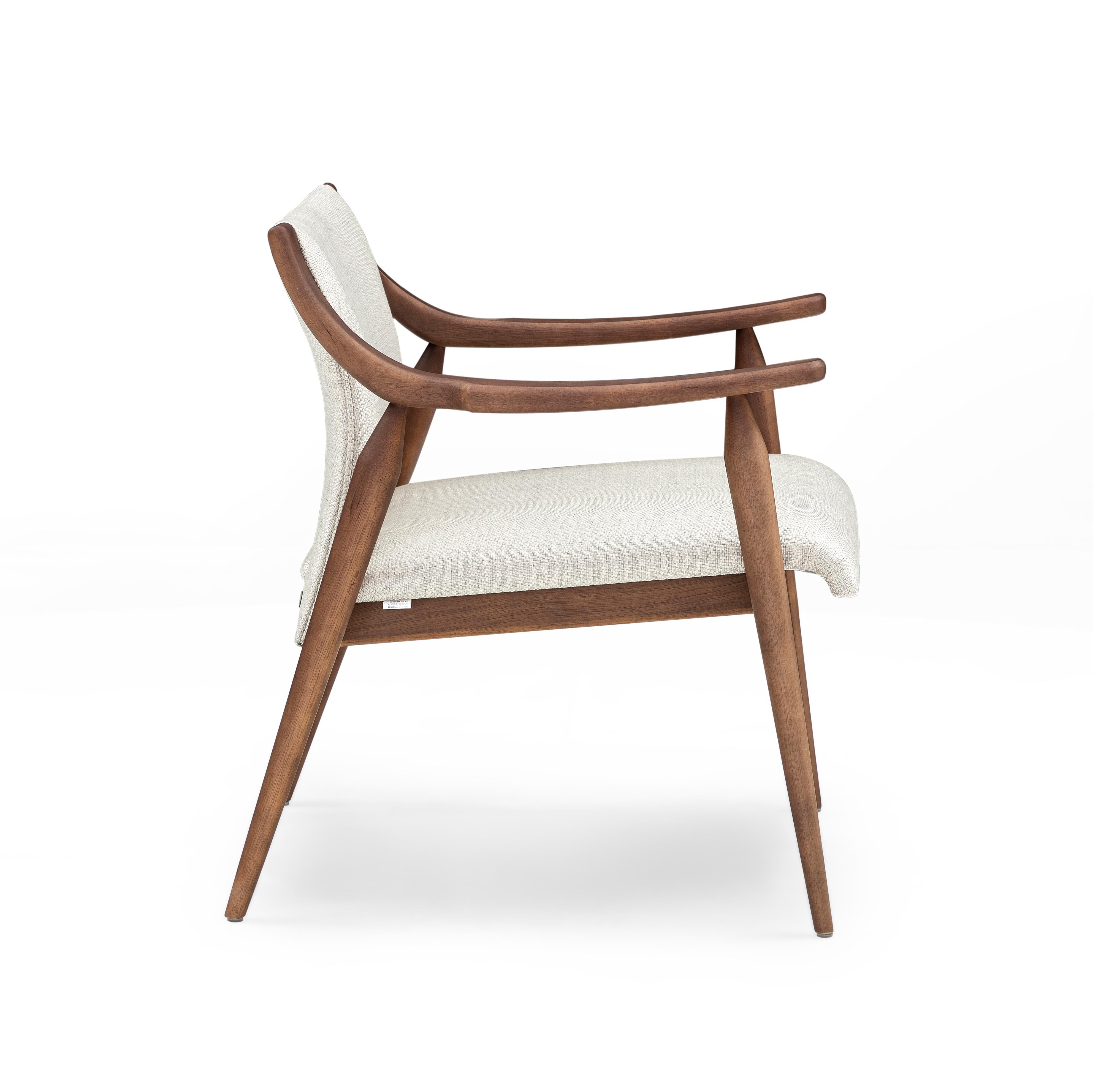 Mince Armchair Featuring Curved Arms and Spindle Legs in Walnut Wood Finish In New Condition For Sale In Miami, FL