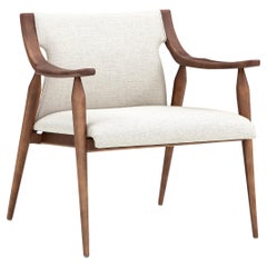 Mince Armchair in Walnut Featuring Curved Arms and Spindle Legs