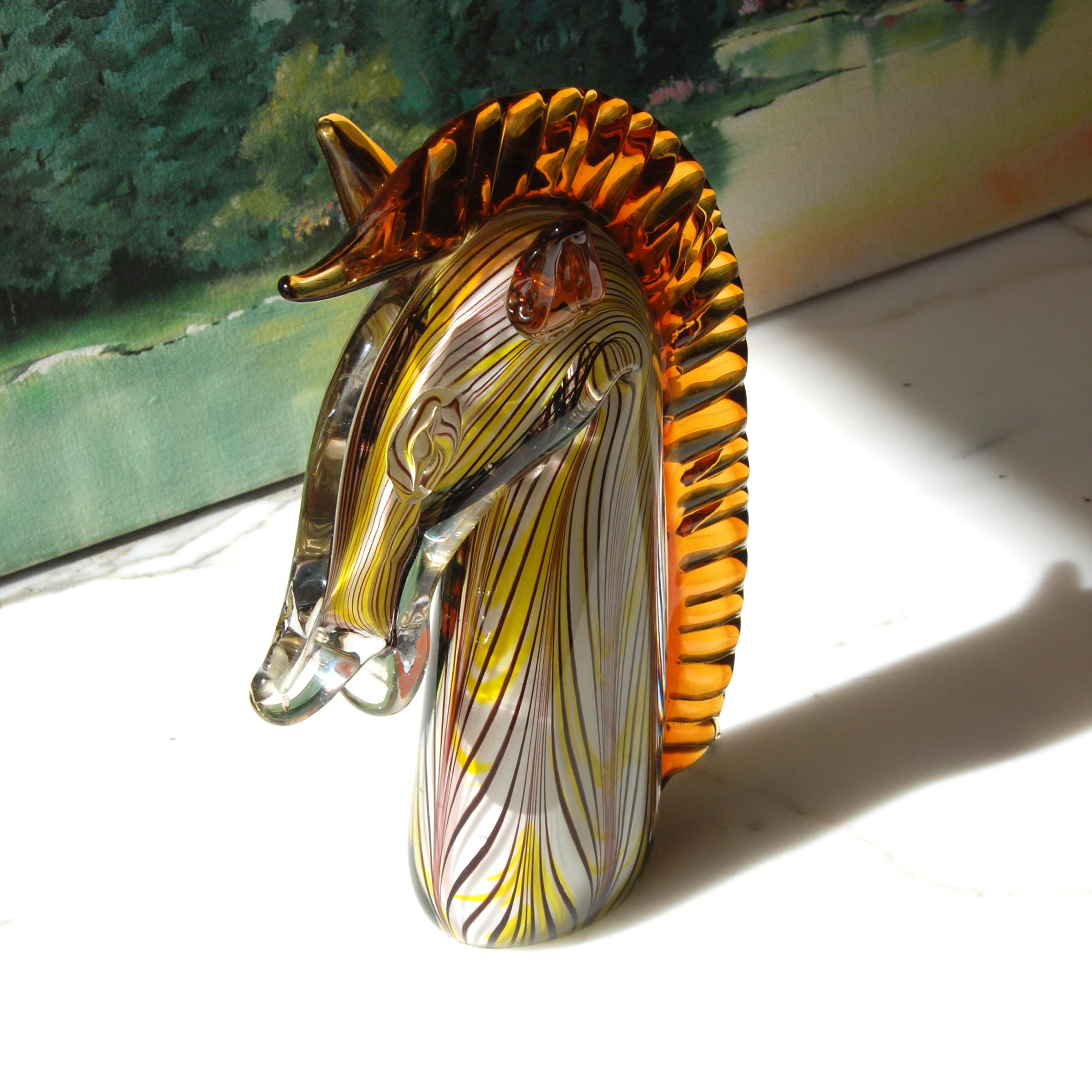 Minchella Murano glass horse sculpture 

Lovely piece in amber tones. Signed.

 