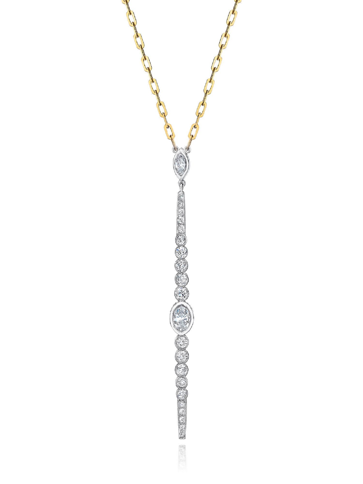 Diamond Marquise bar pendant necklace. 18k Yellow Gold 20 inch long chain. Pendant is approximately 2.90 carats of Diamonds set in Platinum; 3 inches long.