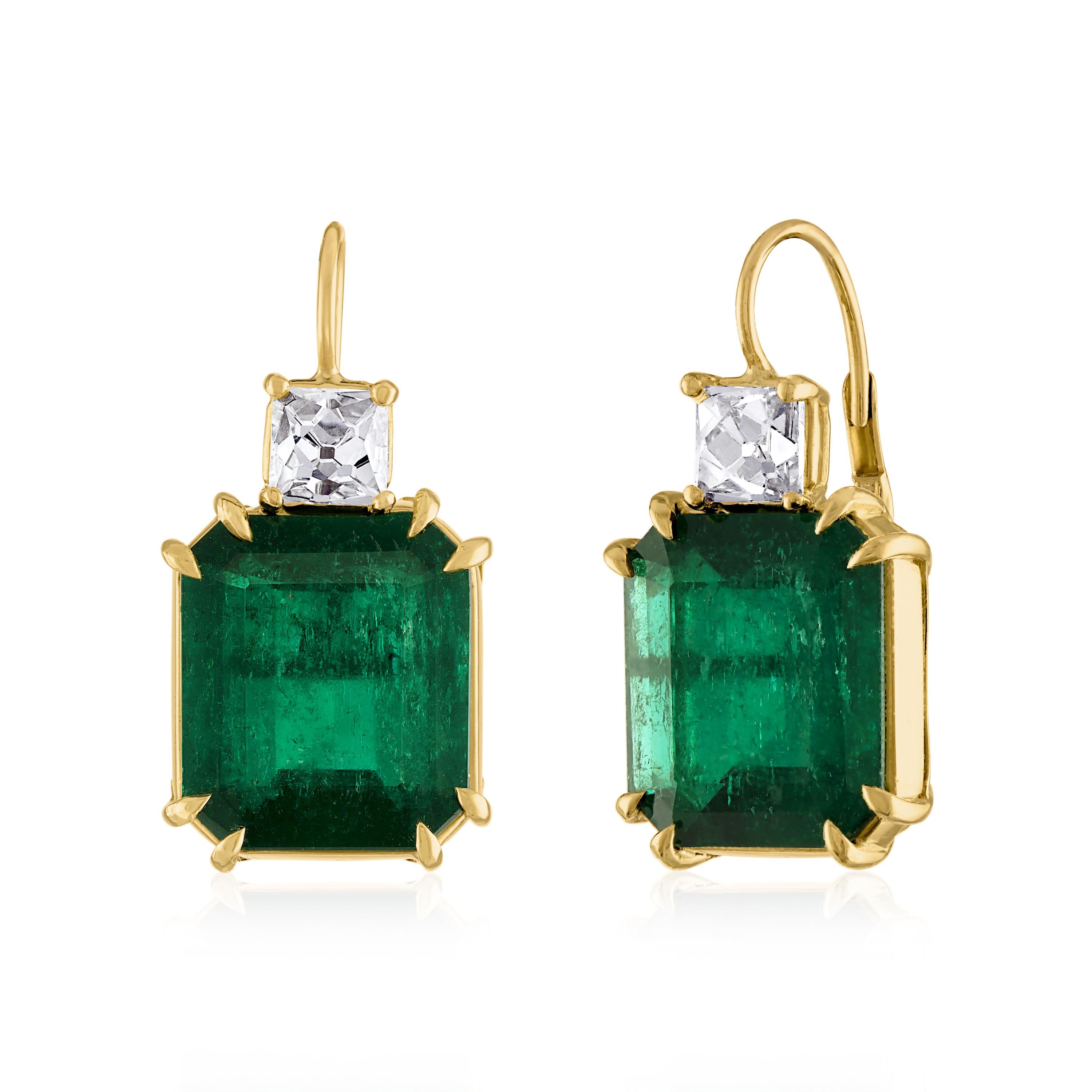 Emerald and French cut diamonds are a favorite combination at MMNY. These custom large drops are a true heirloom purchase. 
Two Colombian Emeralds 19.50 CTW and two French Cut Diamonds 2.15 CTW, set in 18k Yellow Gold. Lever back.