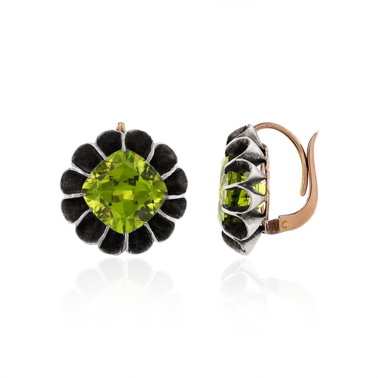 Mindi Mond's Reconceived One-of-a-Kind Cushion Cut Peridot Drop Earrings will transport you back in time to the captivating Victorian era. These vibrant earrings are a timeless ode to the romantic Victorian era, meticulously crafted to capture the