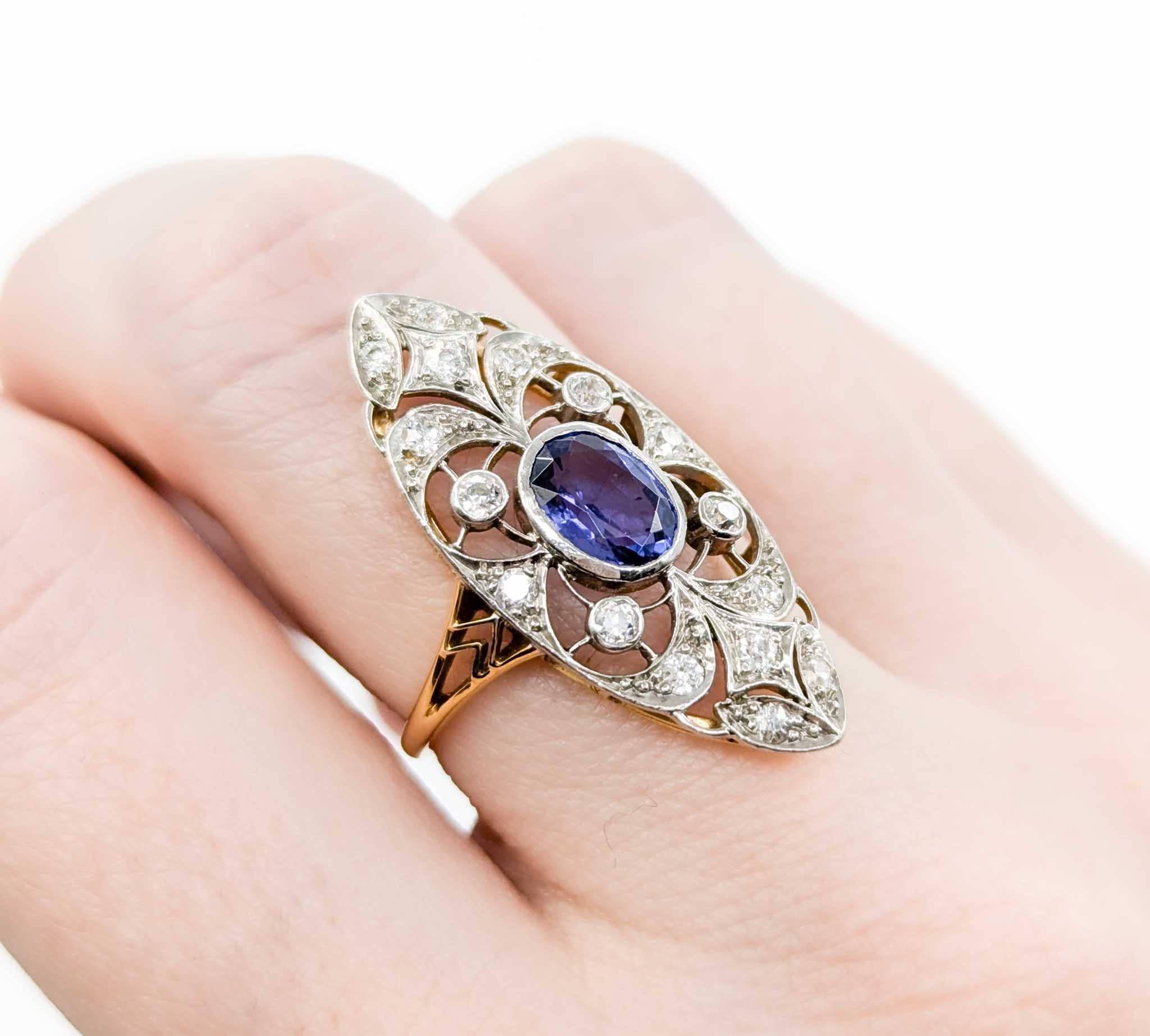 Ring aus 18 Karat Gelbgold und Platin mit Diamanten im Minenschliff und Tansanit Damen