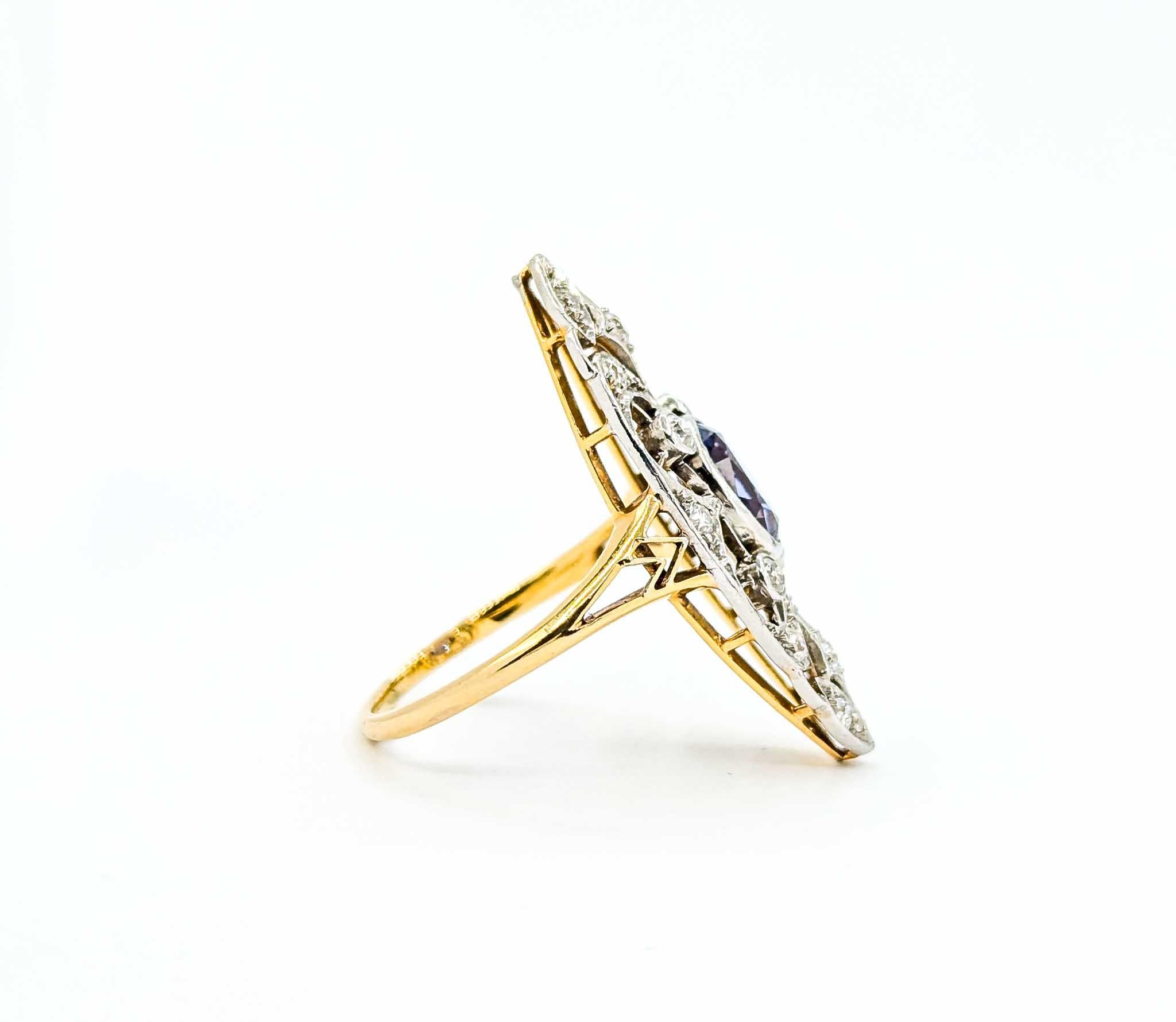 Ring aus 18 Karat Gelbgold und Platin mit Diamanten im Minenschliff und Tansanit 1
