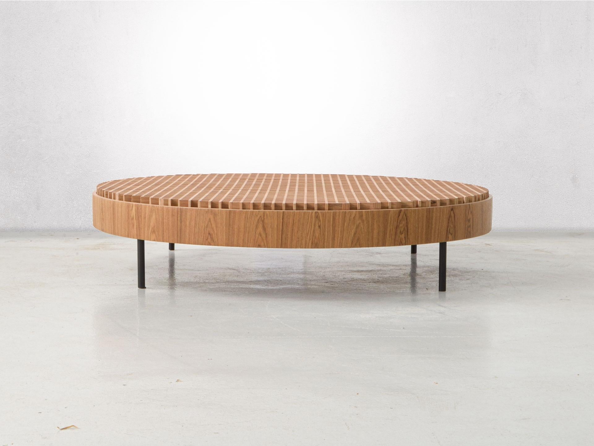 The beautiful Mineira coffee table was designed by Ronald Sasson in 2020. 
The simple lines from the minimalistic design combined with the thoughtful details of the woodwork on the top give a lot of character to this outstanding piece. 

The