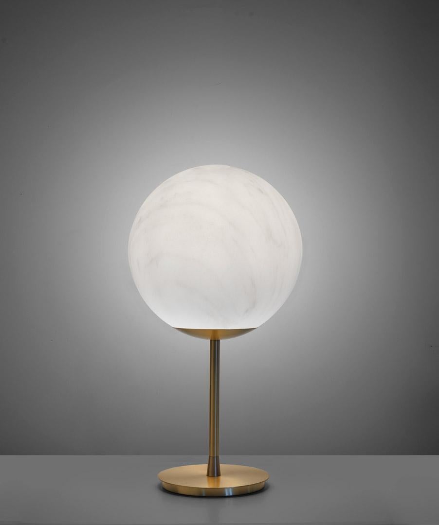 Mineral Grey Veinings Stand Table Lamp by SLIDE Studio
Dimensions: Ø 30 x H 55 cm.
Materials: Polyethylene and satin brass.

Available in different finishes and sizes. This product is suitable for indoor and outdoor use. All our lamps can be wired