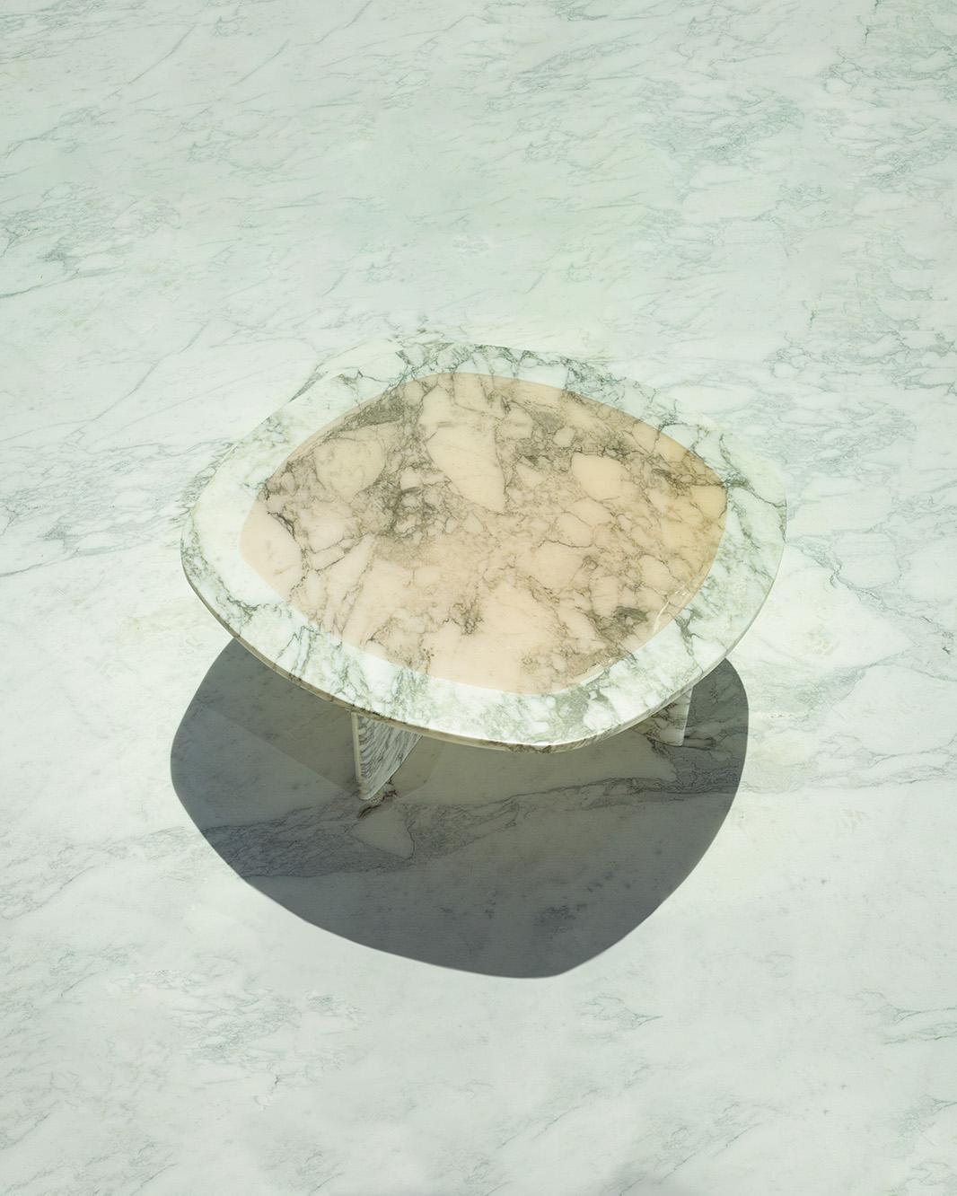 Minerals Arabescato, Rounded Square Low Table by Carla Baz
Dimensions: L 100 x W 100 x H 35/45 CM
Weight: 65 kg
Material: Brescia Viola Marble, Resin.
Also available in other shapes: Round, Rounded square.

The Minerals low table series are an