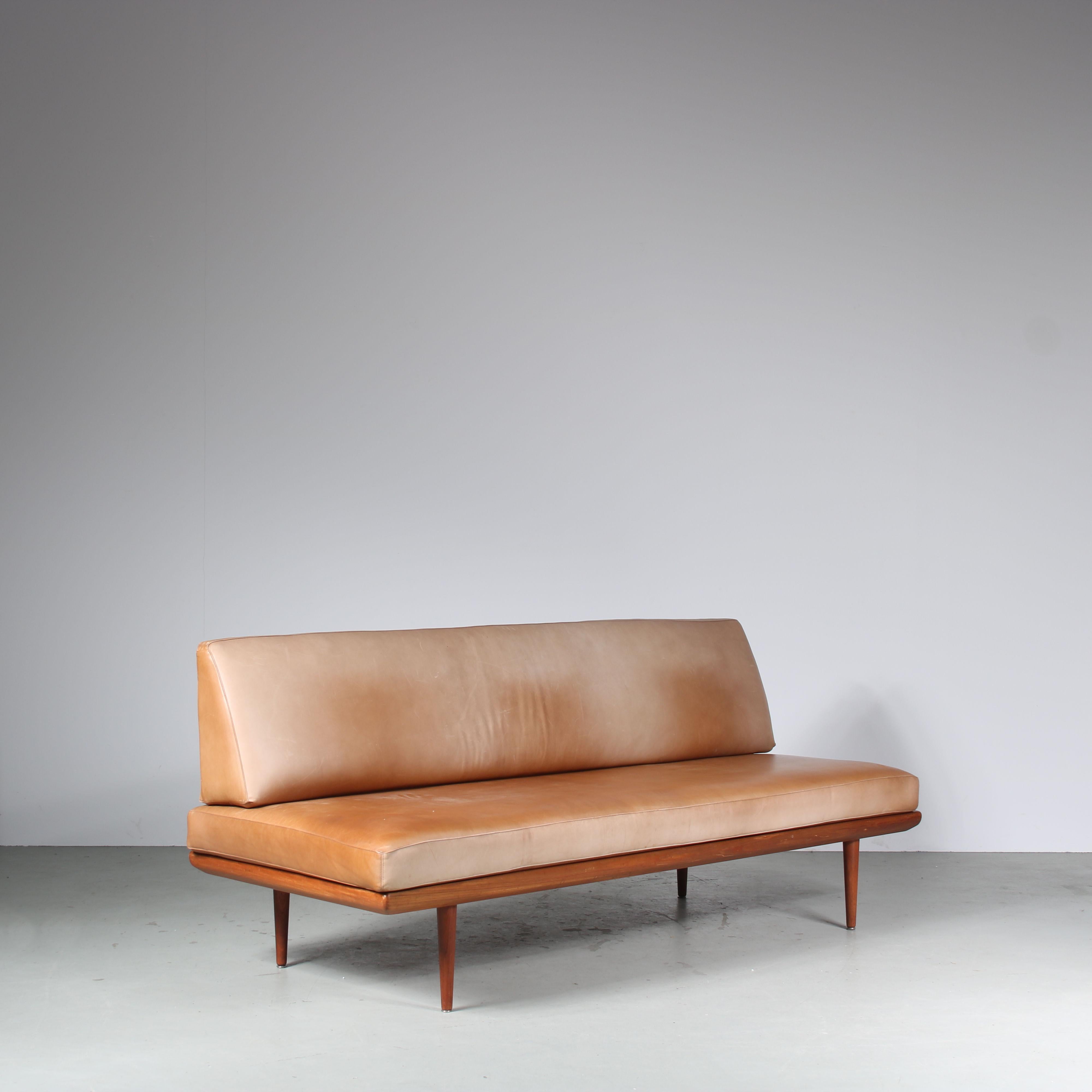 A wonderful sofa / daybed, model “Minerva”, designed by Peter Hvidt & Orla Mølgaard and manufactured by France & Son in Denmark around 1950.

Made of high quality teak wood in a beautiful warm brown colour with elegant finish and gently tapered