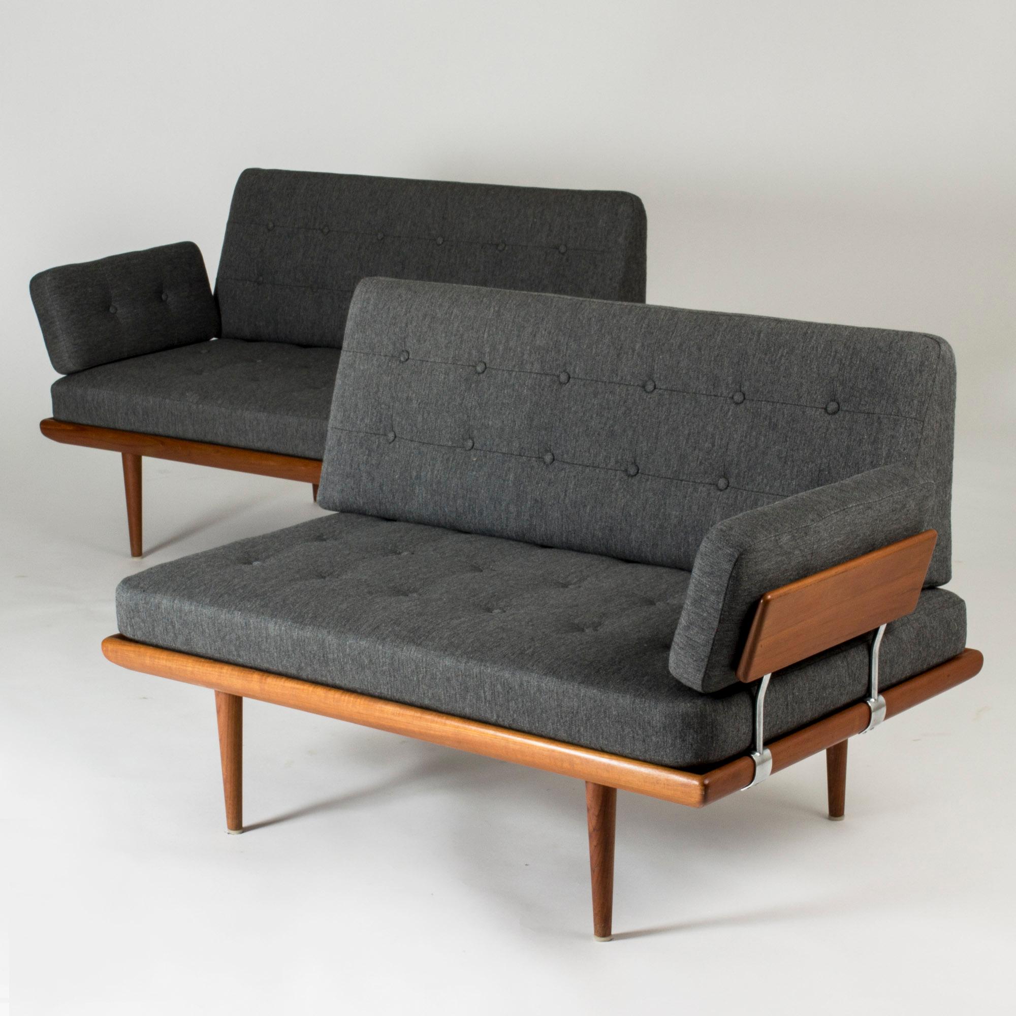 “Minerva” sofa by Peter Hvidt and Orla Møllgaard, made up from two sections. Can be easily switched into a daybed by removing the back cushions. Made from teak with metal details, a sleek and modern design.