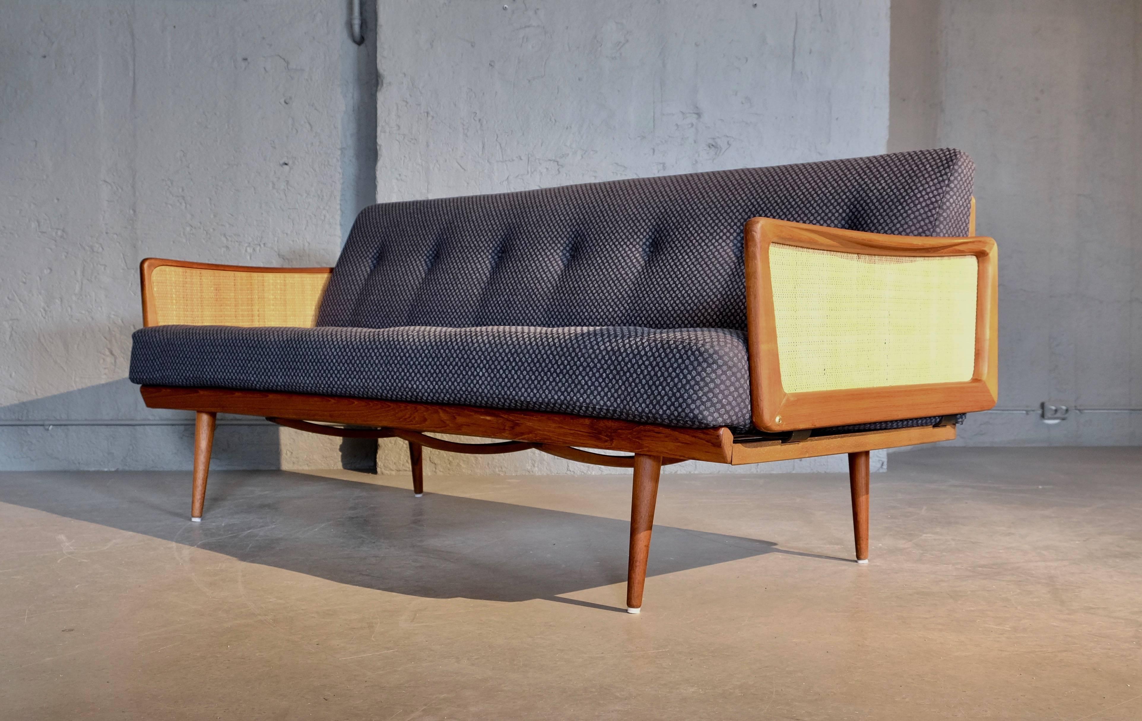 Produced by France & Son in Denmark
Teak and blue/grey fabric.