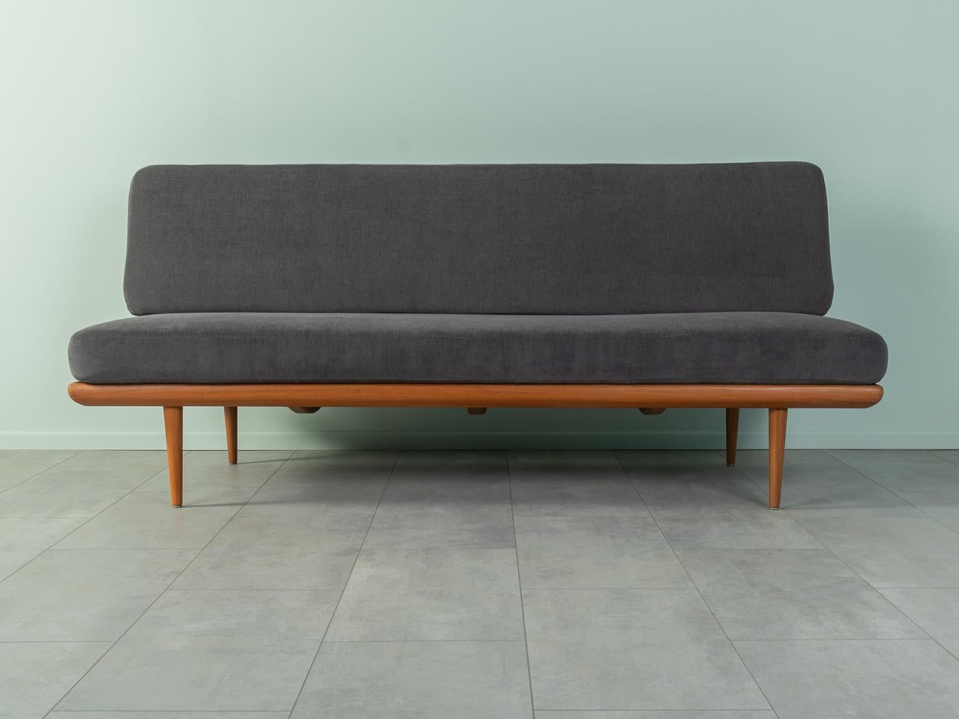 Wonderful Minerva sofa by Peter Hvidt & Orla Mølgaard-Nielsen from the 1960s. Solid teak frame. The original spring core has been reupholstered and covered with a high-quality fabric in dark grey.
Measures: Sitting height 45 cm
Seat depth 48