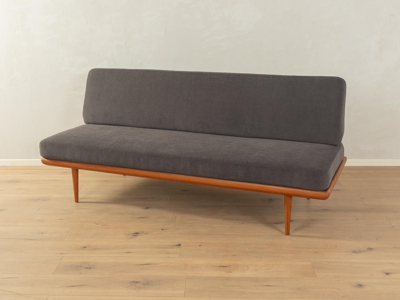 Wonderful Minerva sofa by Peter Hvidt & Orla Mølgaard-Nielsen from the 1960s. Solid teak frame. The original spring core has been reupholstered and covered with a high-quality fabric in dark grey.

Quality Features:

    accomplished design: perfect