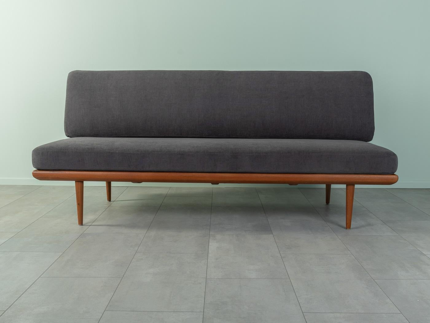 Wonderful Minerva sofa by Peter Hvidt & Orla Mølgaard-Nielsen from the 1960s. Solid teak frame. The original spring core has been reupholstered and covered with a high-quality fabric in dark grey.
Quality Features:

 accomplished design: perfect