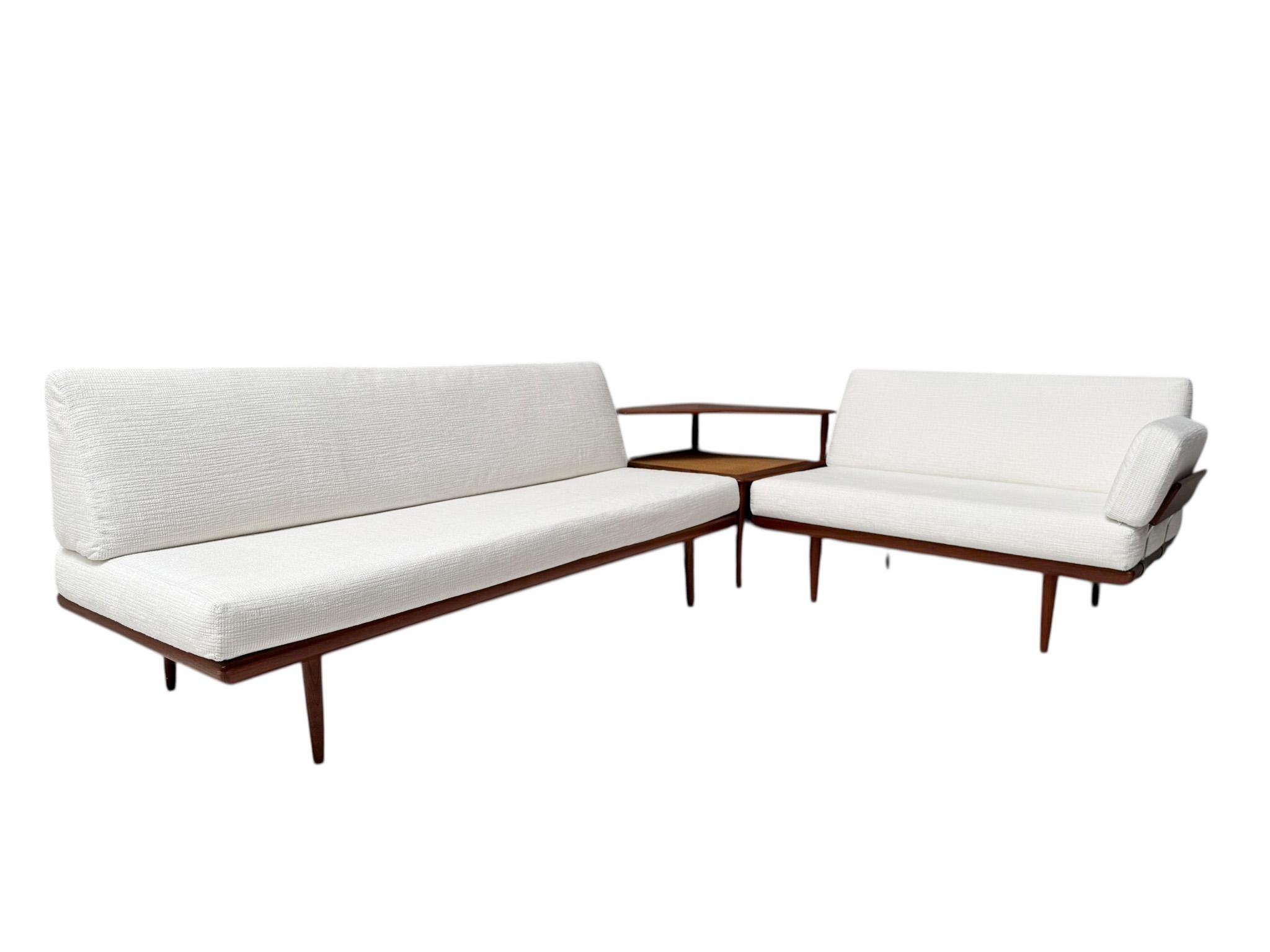 Stunning and elegant Mid-Century Modern Minerva corner sofa set.
Design by Peter Hvidt & Orla Molgaard Nielsen for France & Søn.
Striking Danish design from the 1960s.
Solid teak frames with one armrest.
Seat and back rest and armrests are