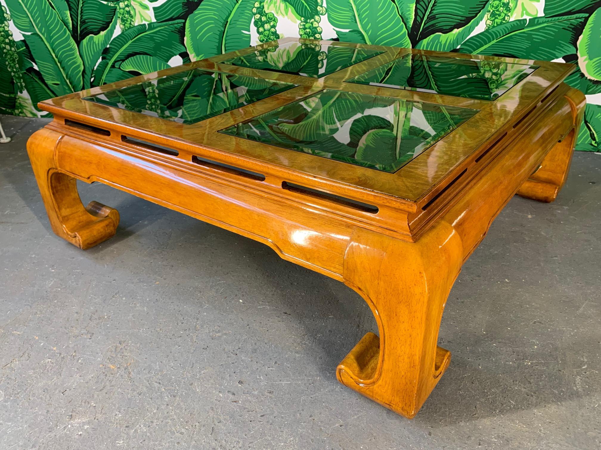 Ming Asian style coffee table features smoked beveled glass inserts and high gloss lacquer finish. Very good condition. Perfect touch of chinoiserie style for any decor.