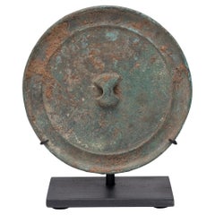 Ming Bronze Mirror with Ingot Knob, c. 1450 Ming Bronze Mirror with Ingot Knob, c. 1450