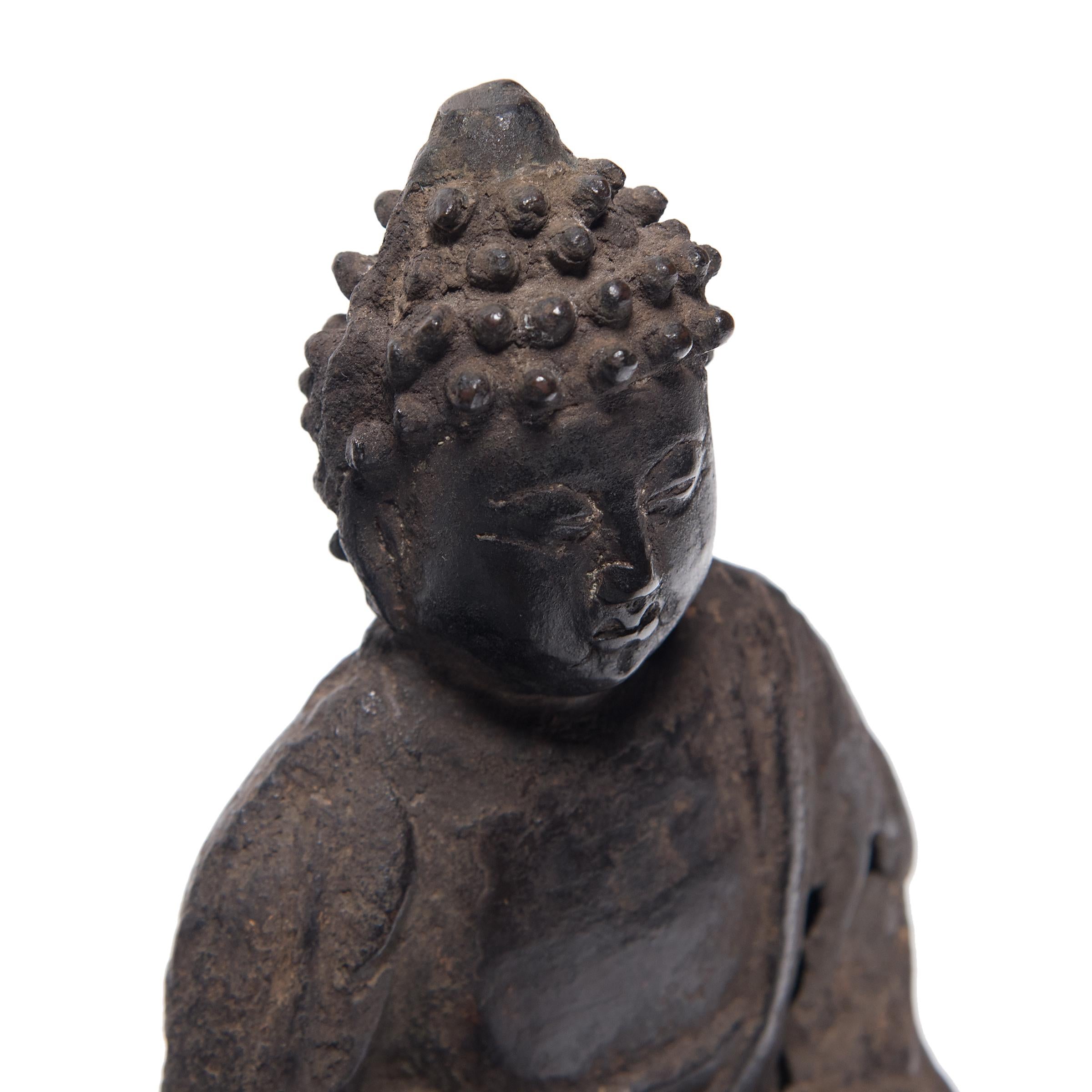 Dated to the late Ming dynasty, this 17th century bronze figure depicts the historical Buddha, known also as Shaka, Shakyamuni, or Siddhartha Gautama. Seated upon a double lotus base, the Buddha embodies virtues of wisdom and composure.

He sits