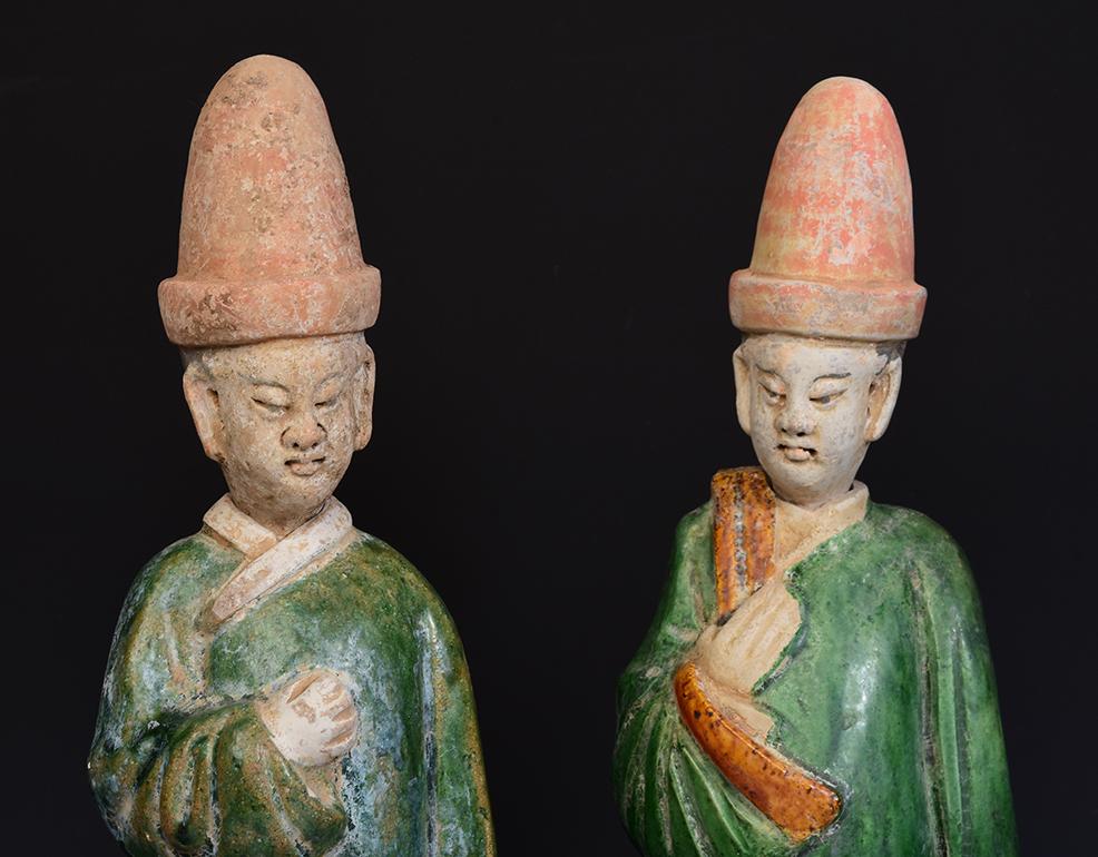 A set of Chinese green glazed pottery court man.

Age: China, Ming Dynasty, A.D. 1368 - 1644
Size: height 41.2 - 42 cm / width 12 - 12.8 cm
Condition: well-preserved old burial condition overall.

100% Satisfaction and authenticity guaranteed with