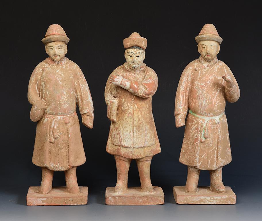 A set of Chinese pottery standing court man.

Age: China, Ming Dynasty, A.D. 1368 - 1644
Size: Height 25.9 - 27.4 C.M. / Width 8.9 - 9.1 C.M.
Condition: well-preserved old burial condition overall with some amount of soil adhering (some