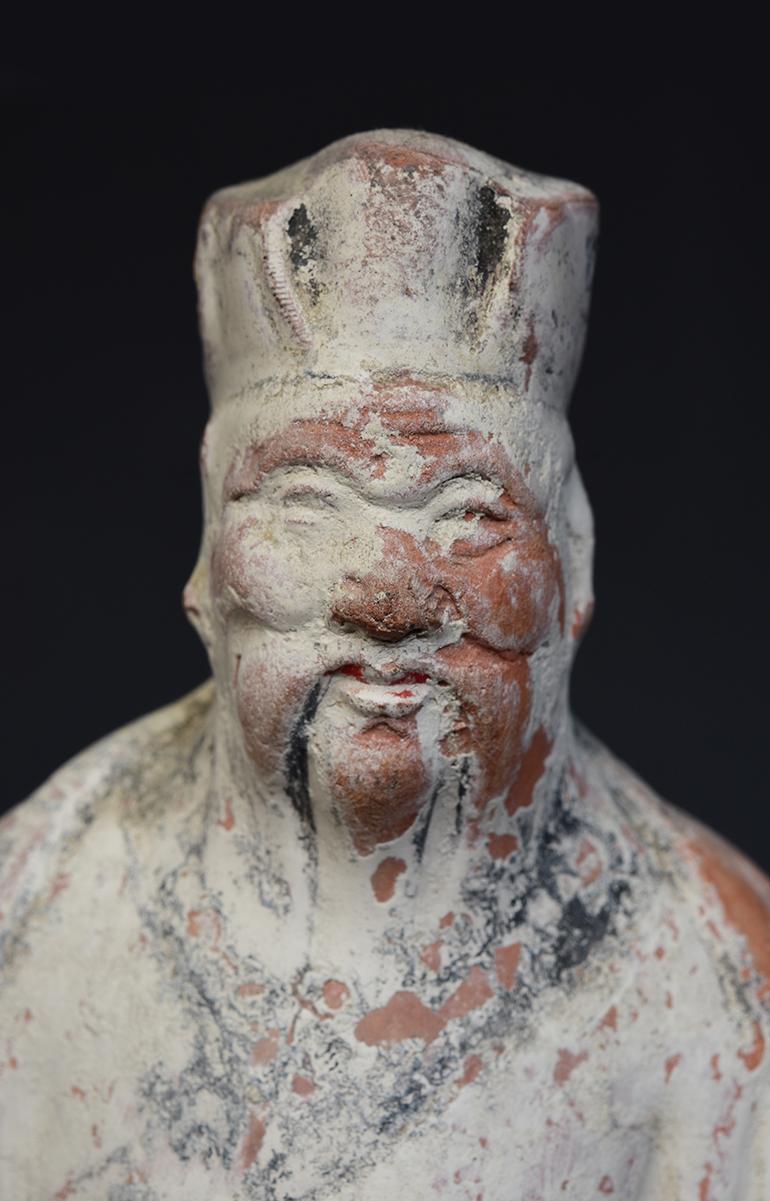 Chinese painted pottery immortal.

Age: China, Ming Dynasty, A.D. 1368 - 1644
Size: Height 23 C.M. / Width 11.9 C.M. / Depth 8.5 C.M.
Condition: Well-preserved old burial condition overall.

100% satisfaction and authenticity guaranteed with