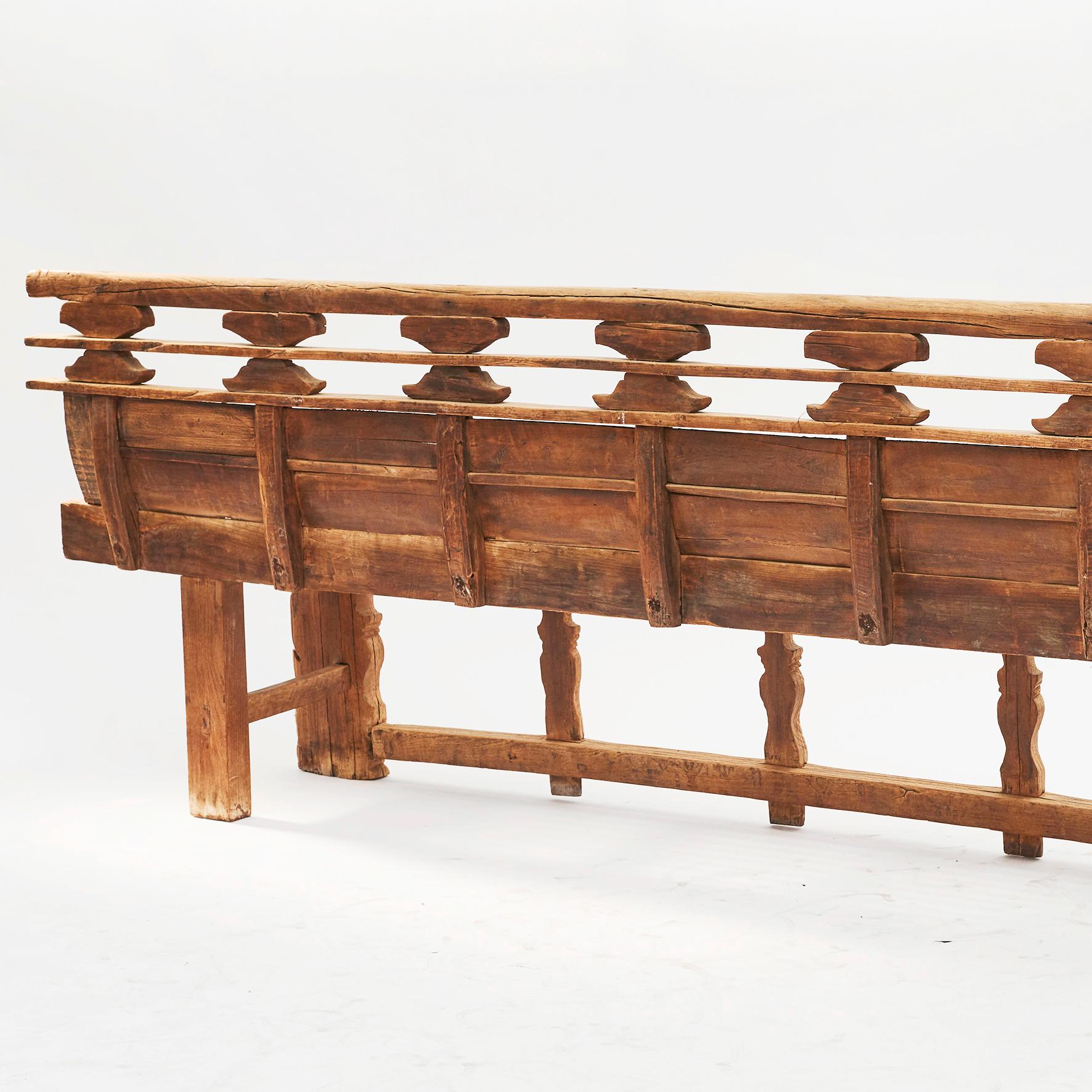 Rare 16th-17th century bench in elm with hand carved details.
Original condition with a great patina.
Shanxi Province, China, 1500-1600.
Ming Dynasty.

Benches like this were seen in front of Chinese temples for people to sit and rest or used to
