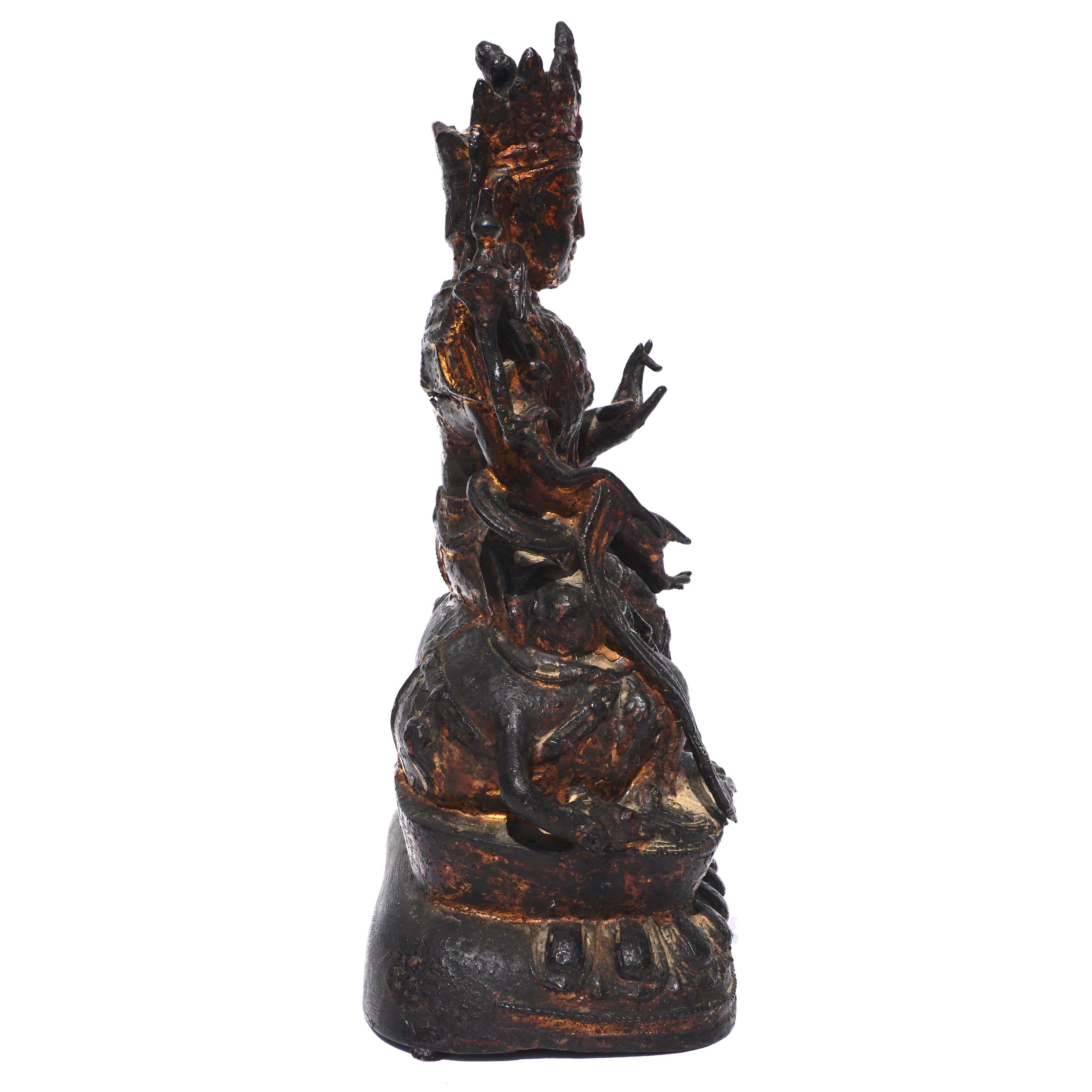 18th Century and Earlier Ming Dynasty Bronze Guanyin Seated On A Mythical Lion Beast 